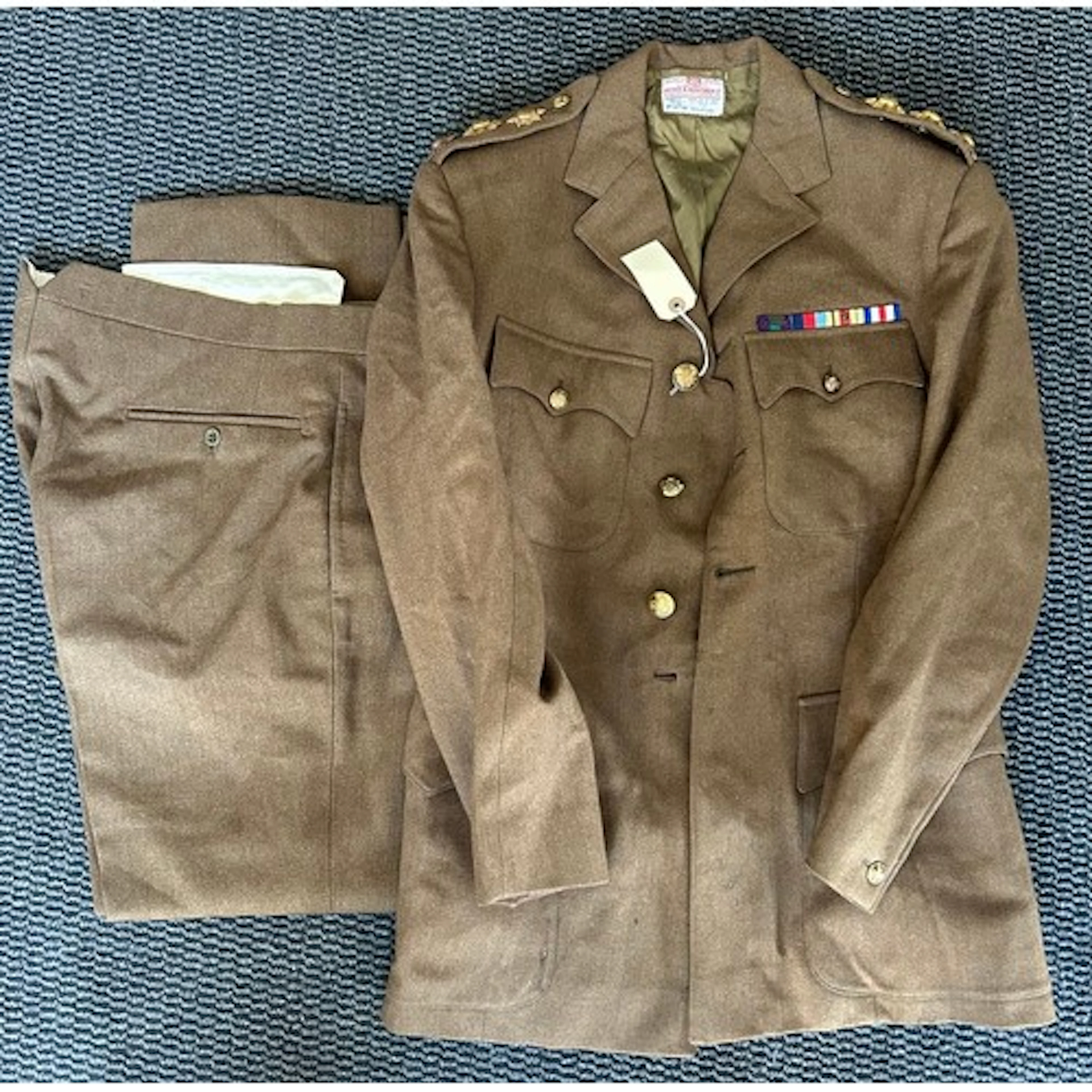 A pre-1953 Grenadier Guards Captains Khaki Tunic with WWII m...