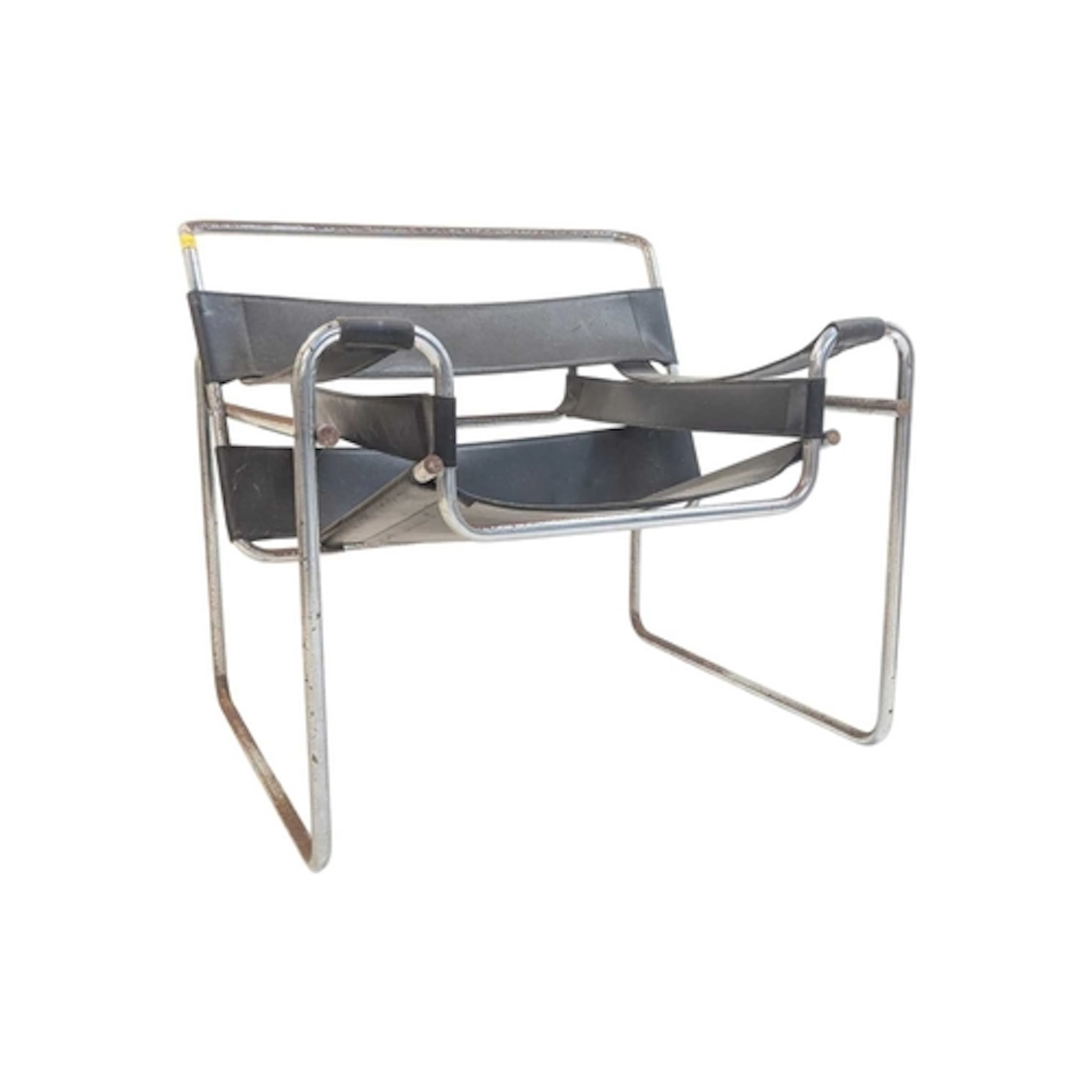 A mid-century black leather and bent chrome Wassily B3 chair...