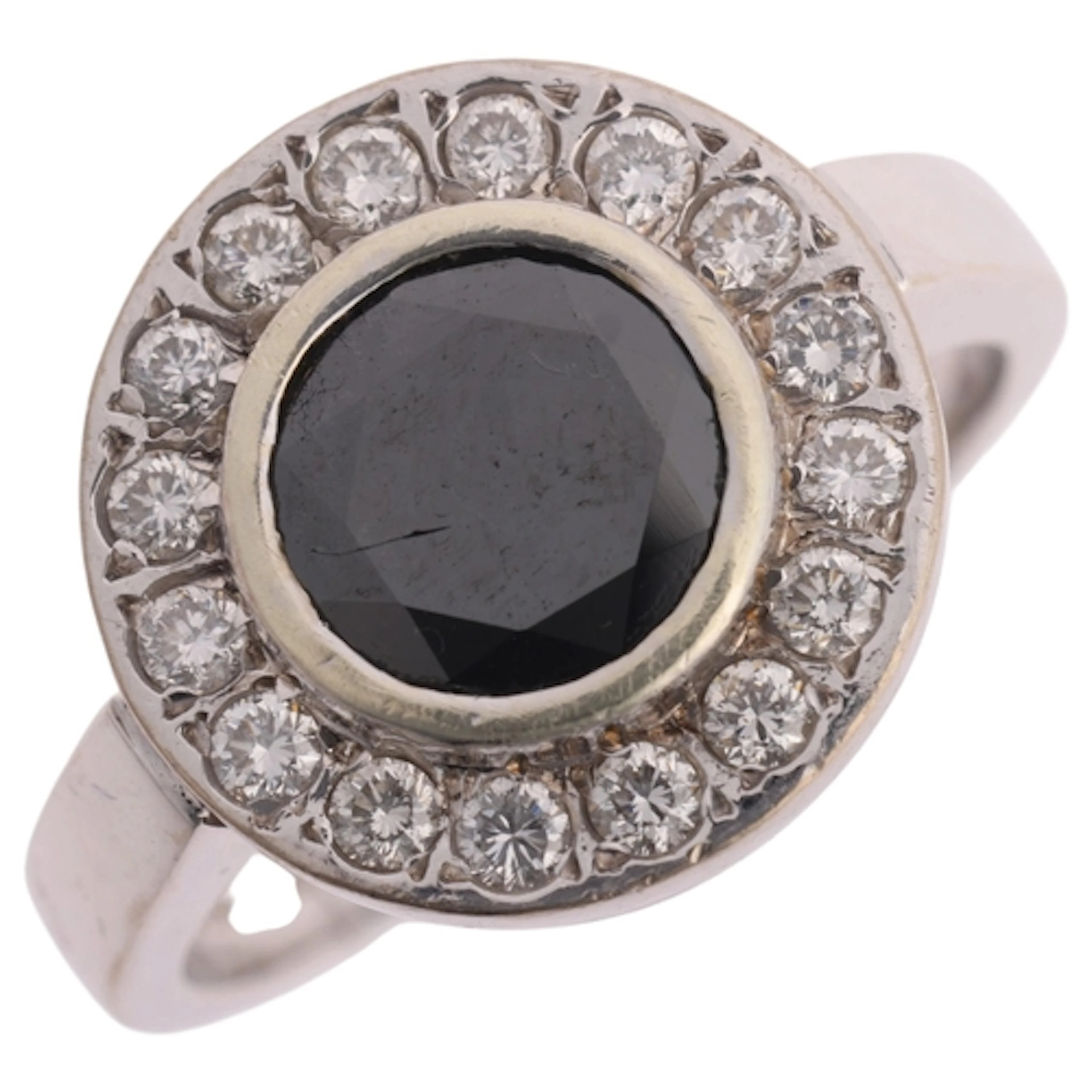 An 18ct white gold black diamond and diamond cluster ring, B...