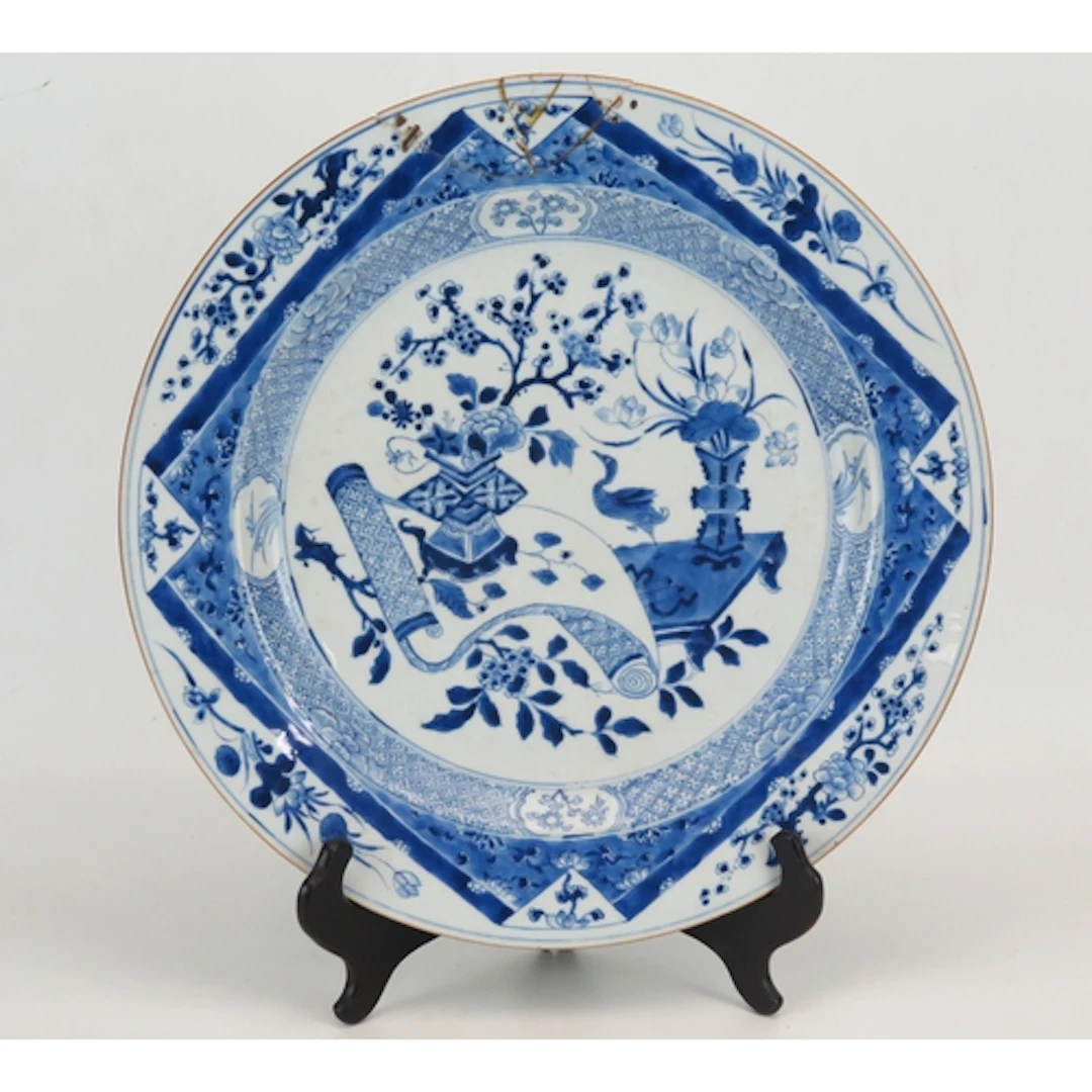 A 19th century Chinese blue and white porcelain charger, dec...