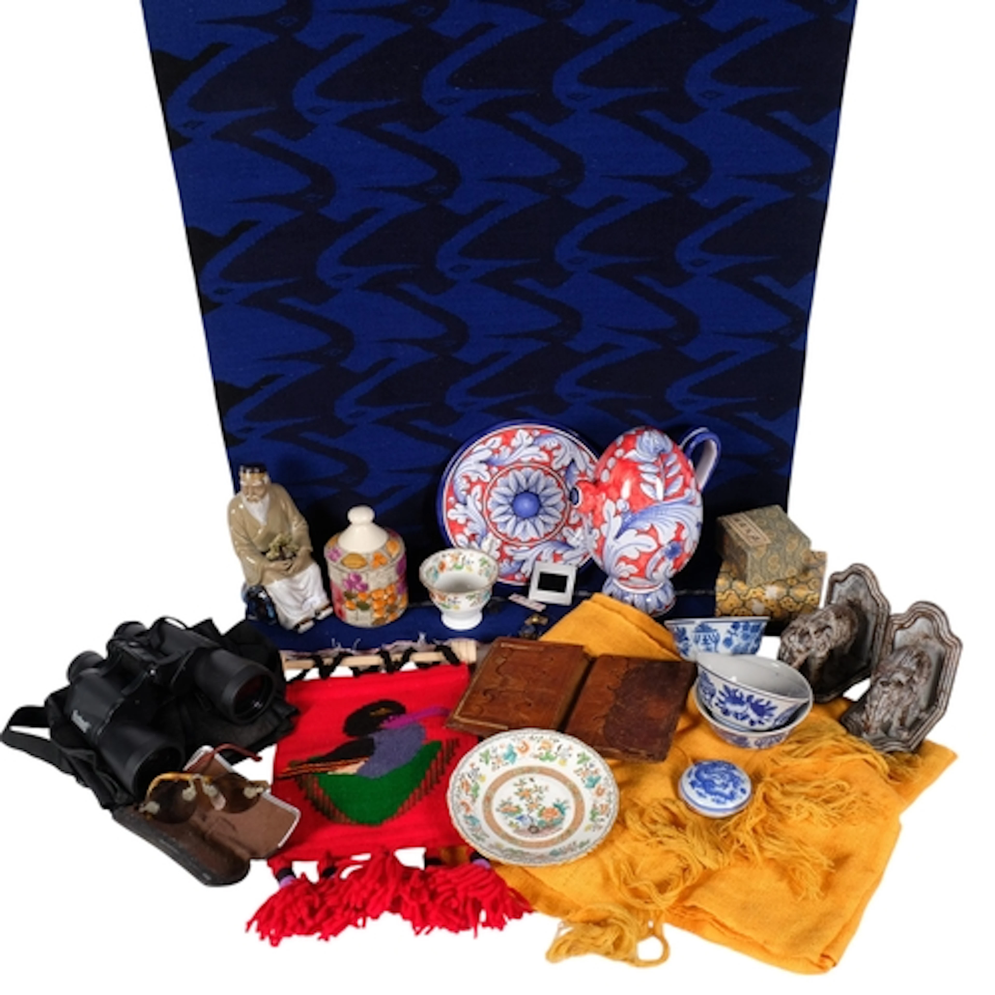 A collection of various items, including pair of metal eleph...