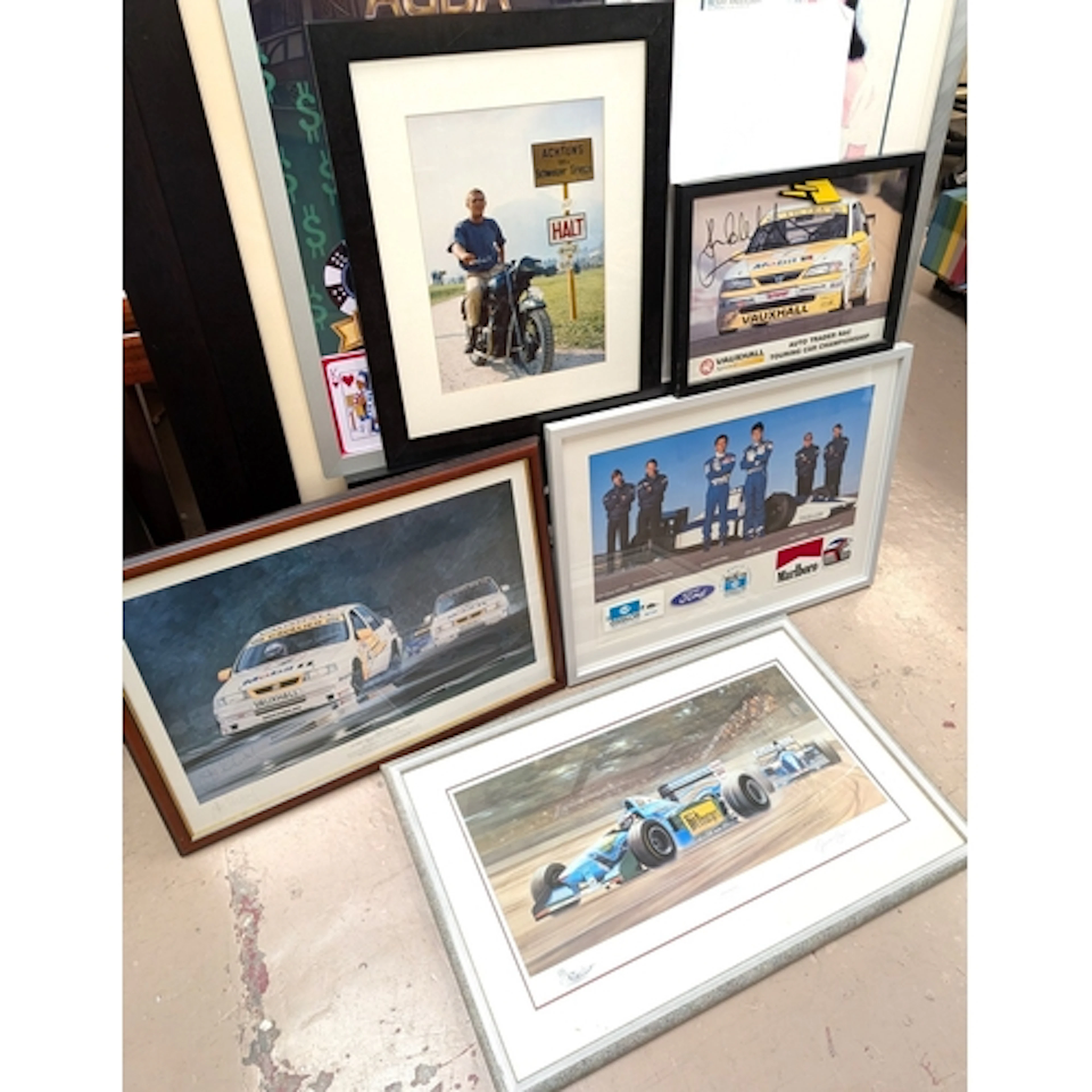 A signed racing print, a Signed Vauxhall photo framed, Steve...