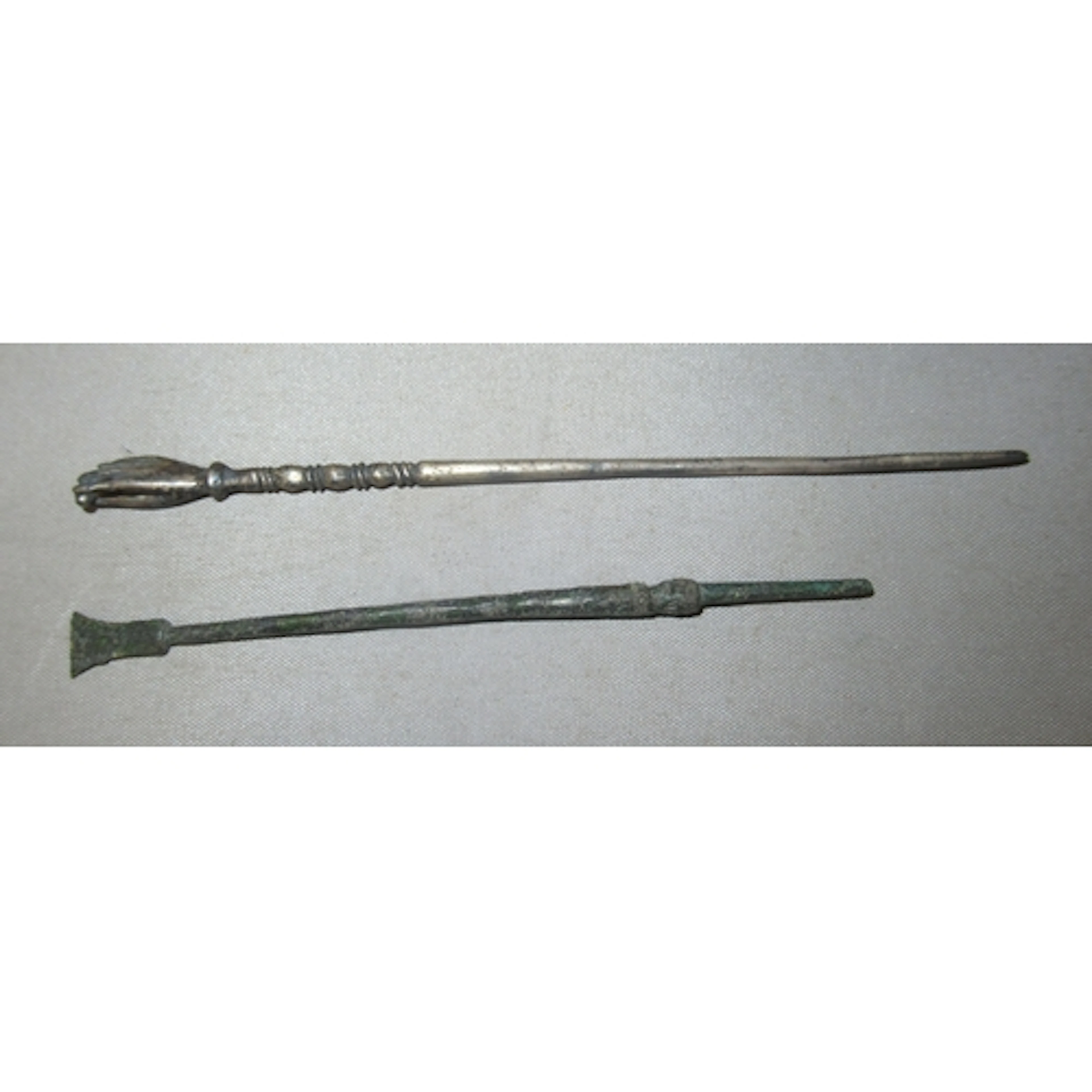 Roman silver hair pin, the terminal in the form of a hand ho...