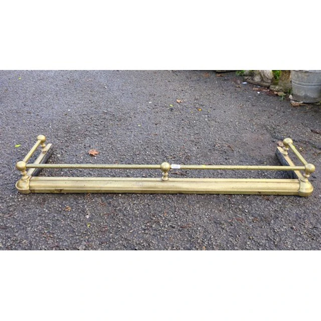 Brass and iron fireplace fender of U-shaped form, with a mou...