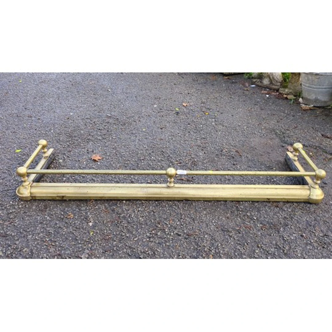 Brass and iron fireplace fender of U-shaped form, with a mou...