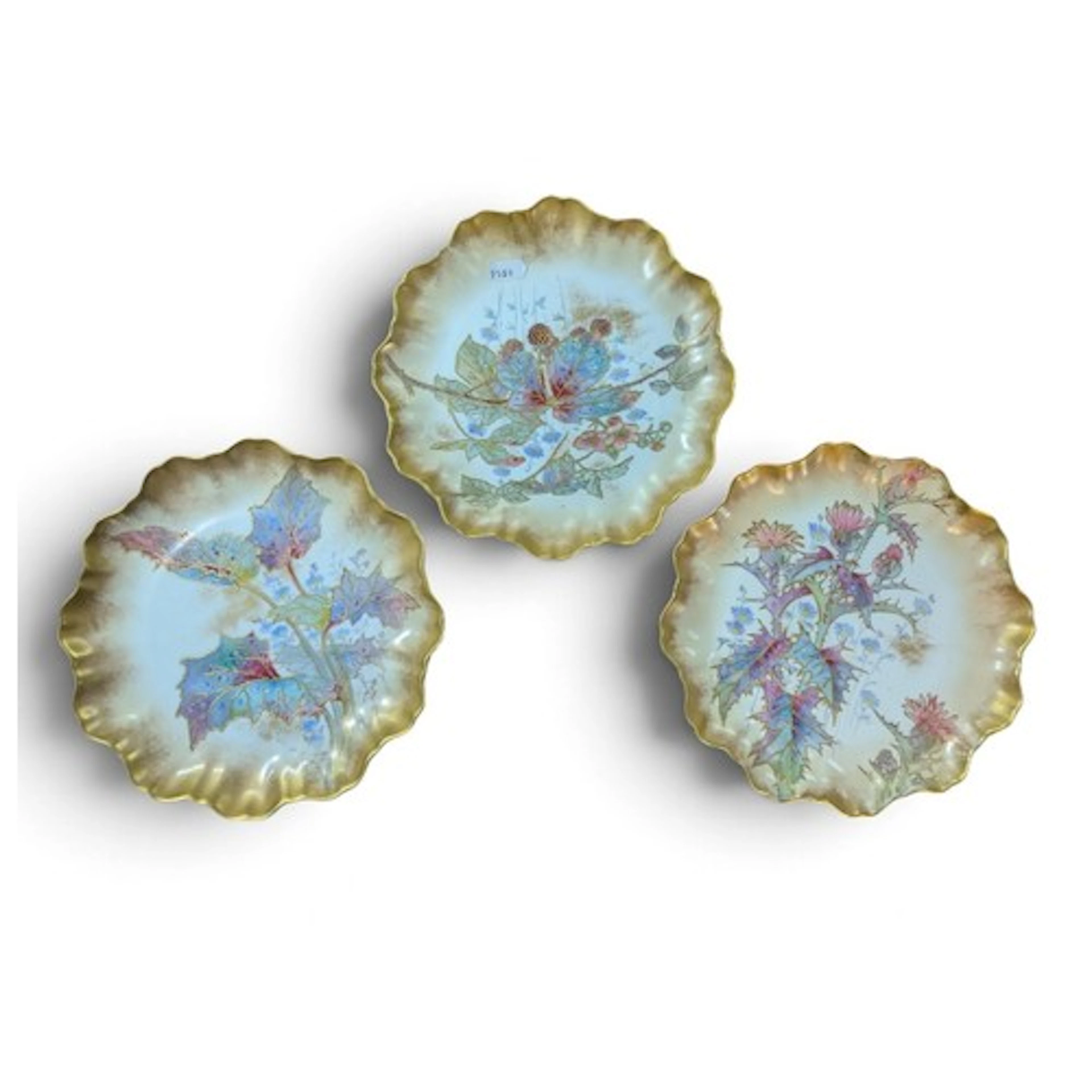 Three Royal Doulton scalloped edge plates with gilt enhanced...