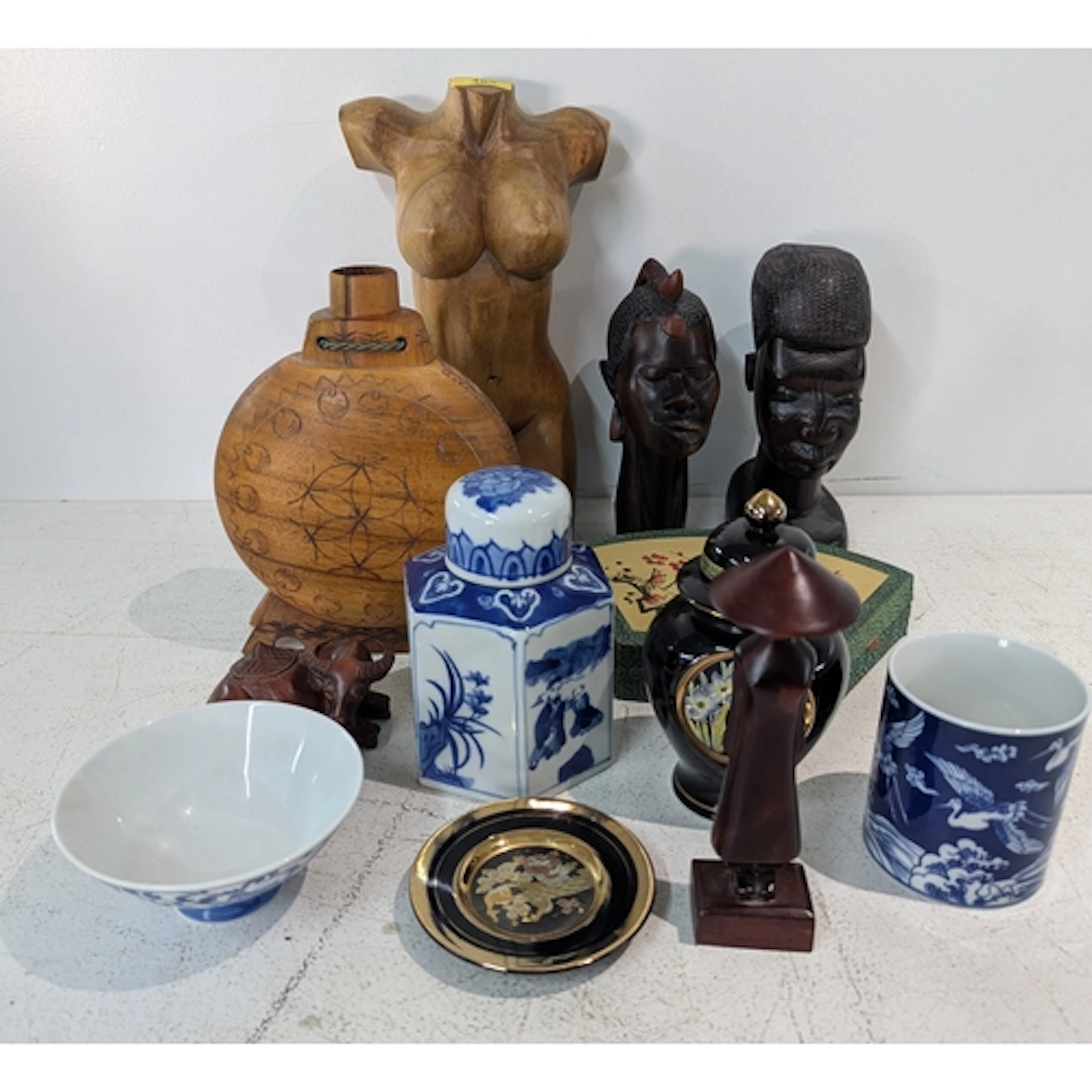 An Oriental themed mixed lot to include a hexagonal lidded b...
