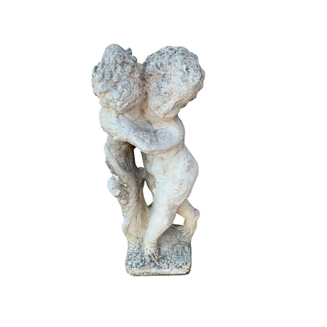 A composite stone figure of a cherub, height 60cm