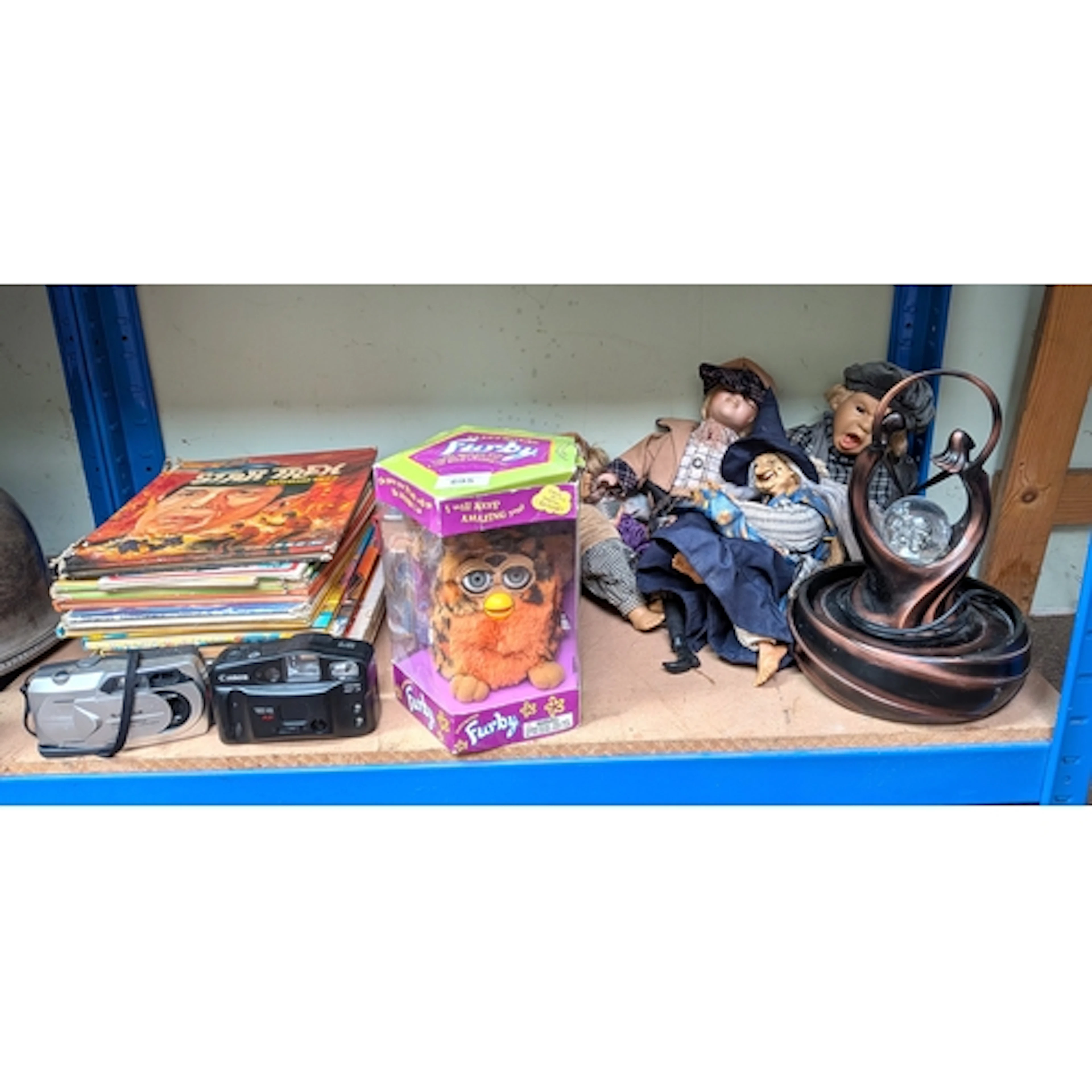 A boxed Furby toy, Canon camera, one other, dolls, Star Trek...