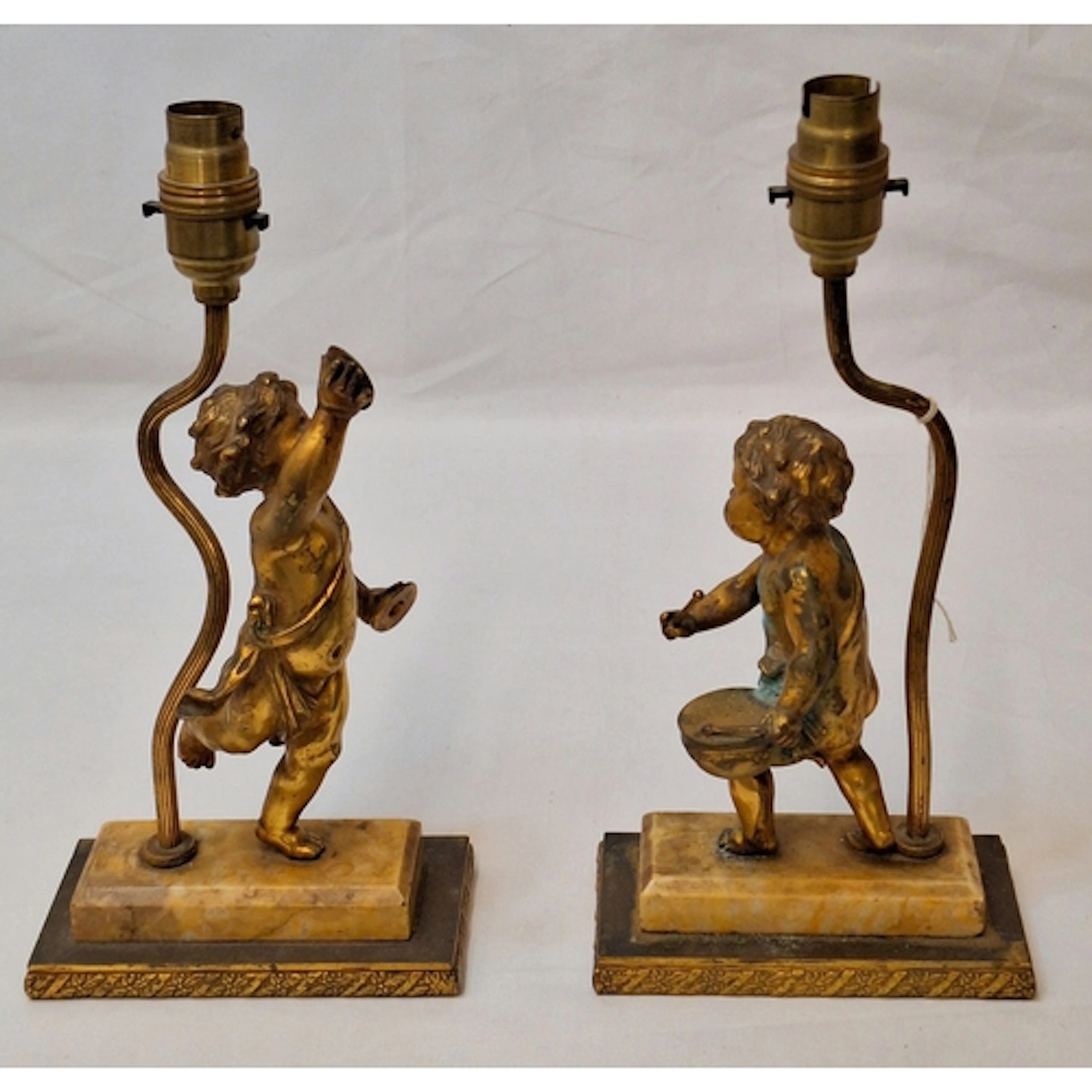 Pair Early C20th Cherub Figural Table Lamps on stepped base,...