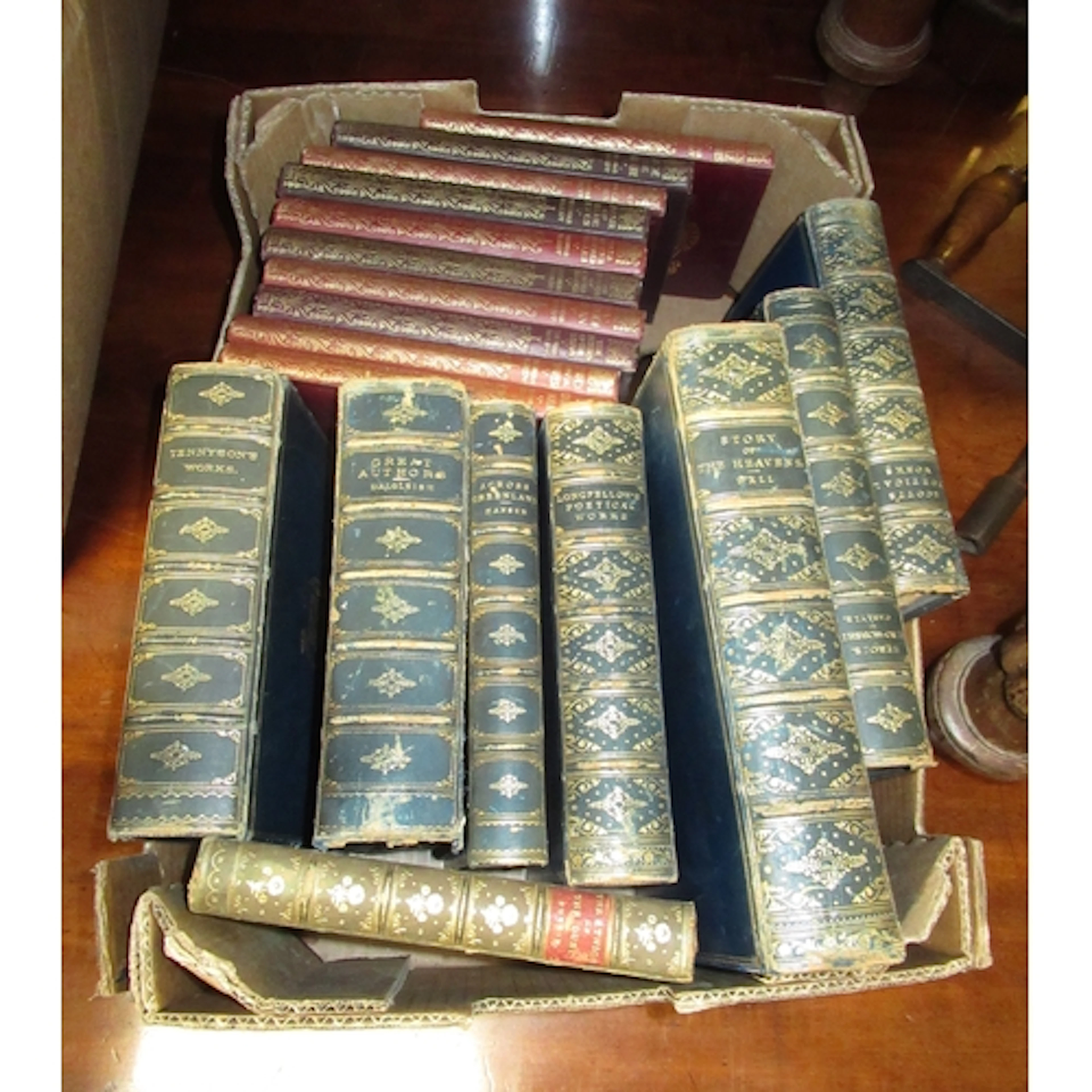 Box containing a quantity of antique leather bound books, to...