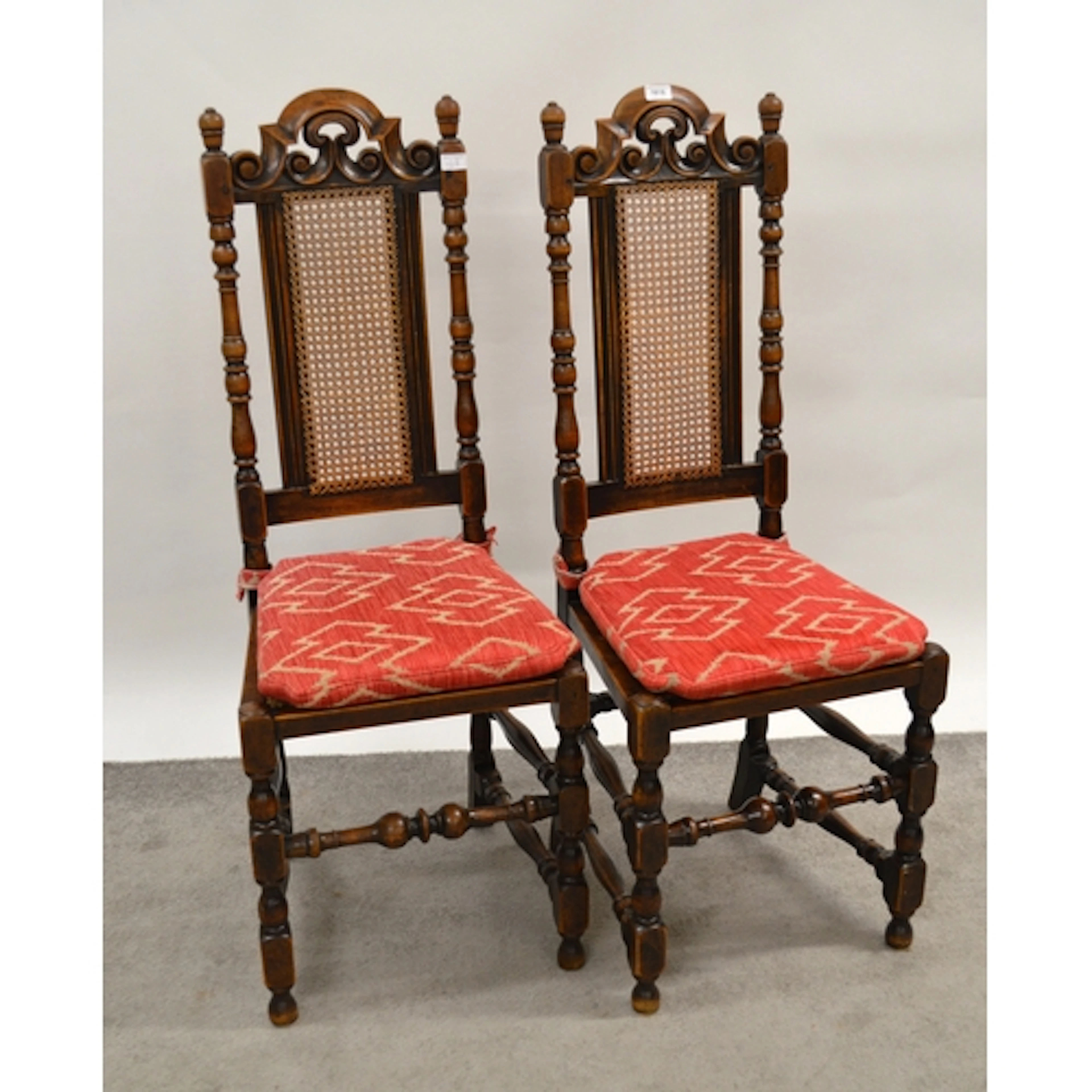 Set of six oak chairs, having cane backs and seats on turned...