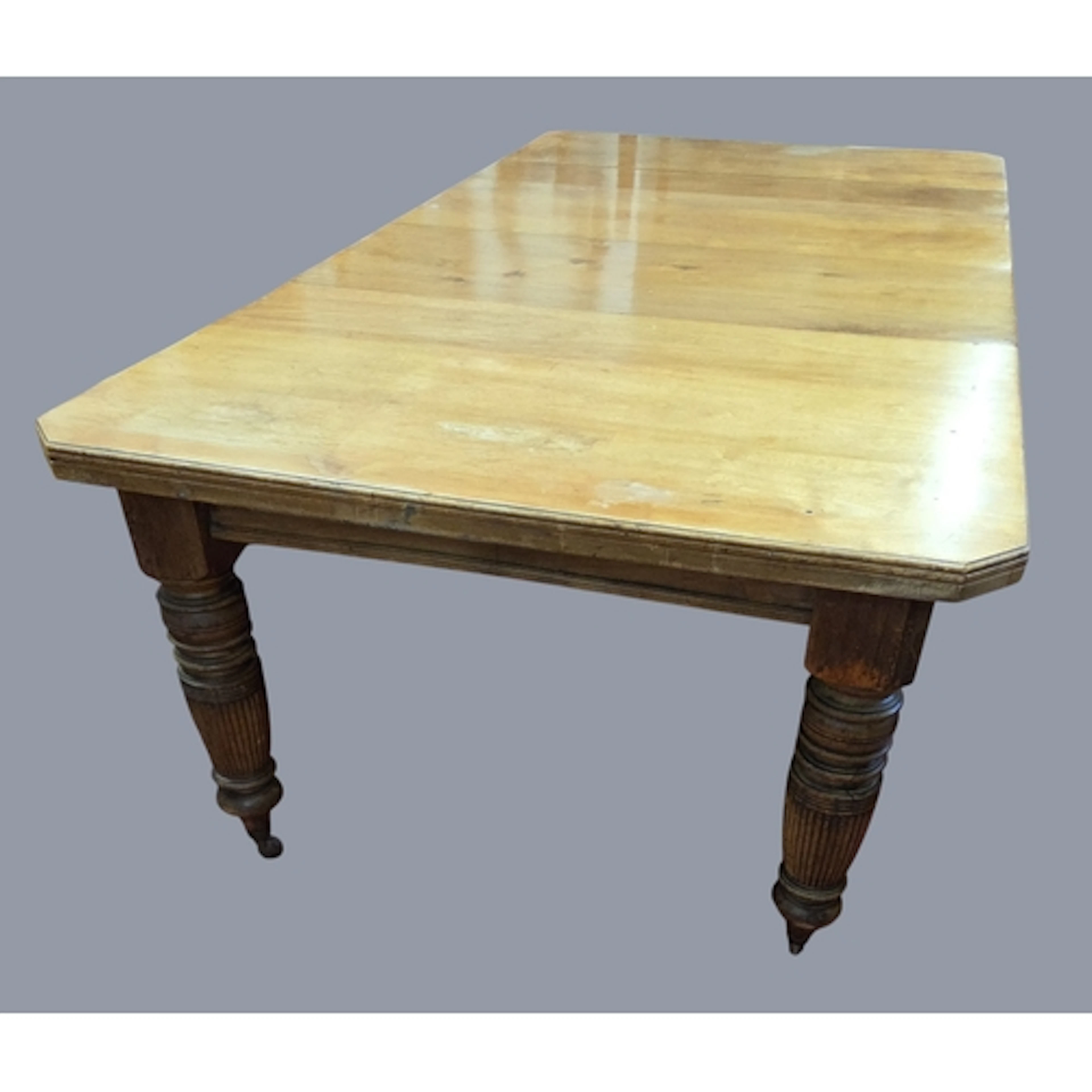 A good 19th Walnut two leaf Dining Table on turned fluted su...