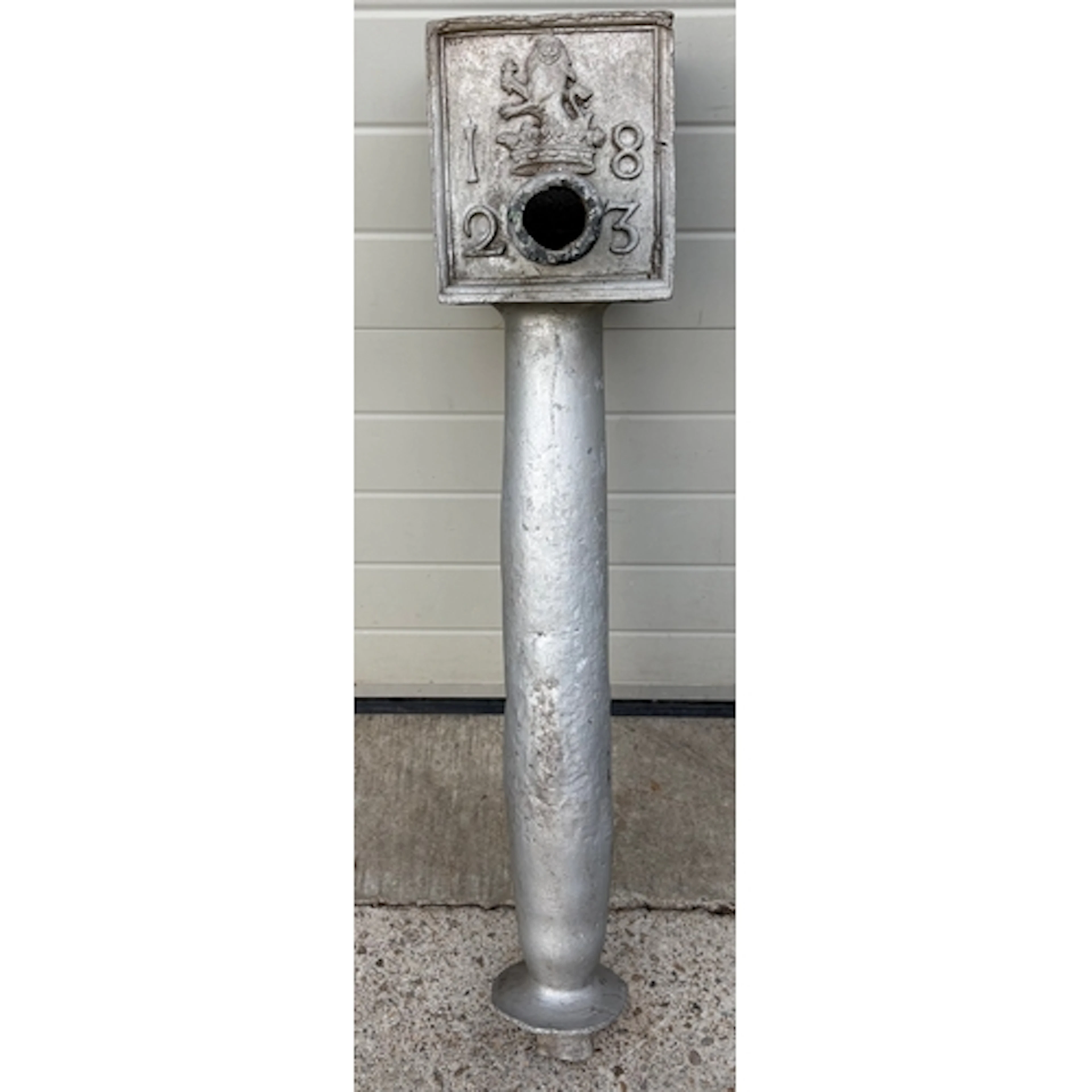 A dated (heavy) lead pump hopper