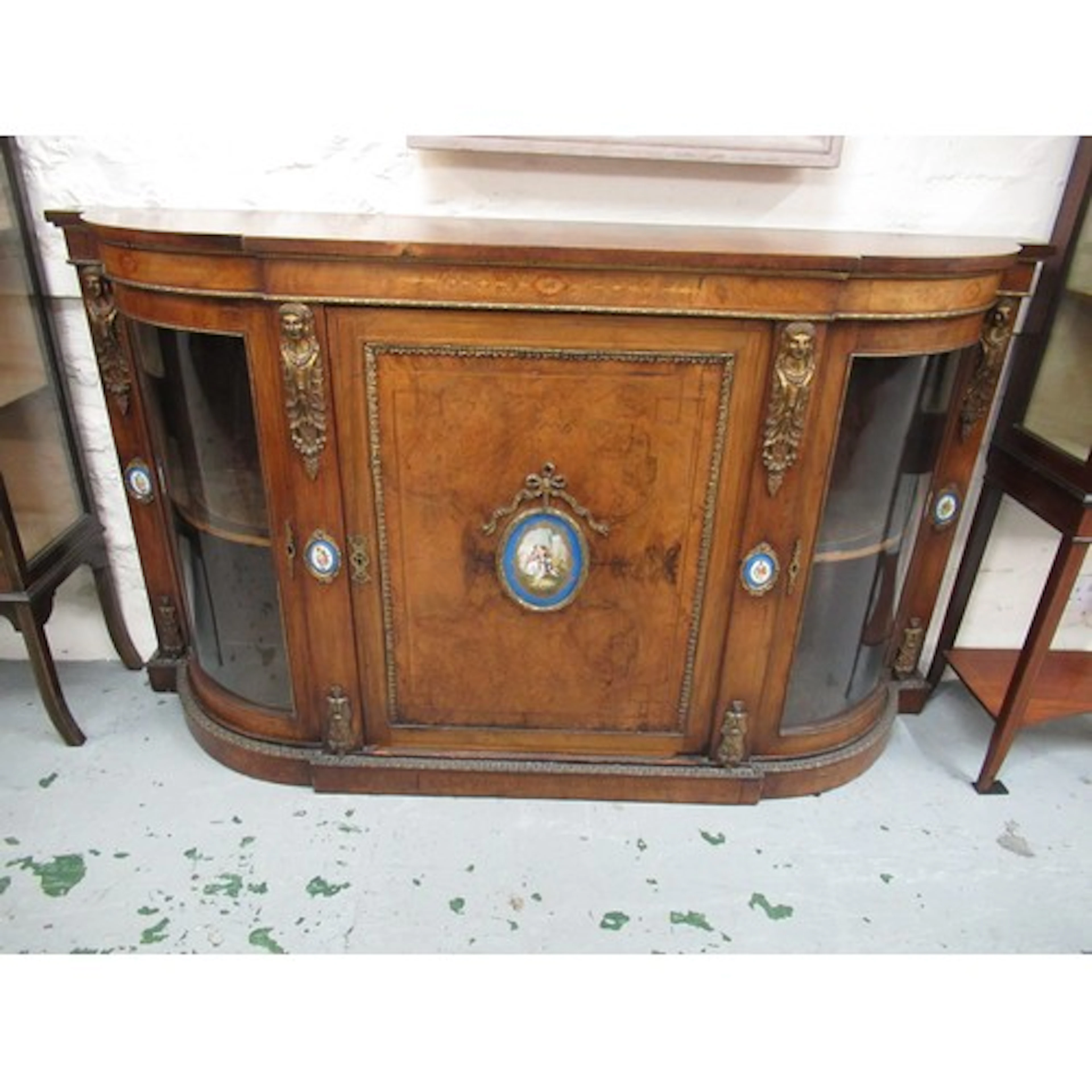 Victorian walnut porcelain and ormolu mounted credenza, the ...