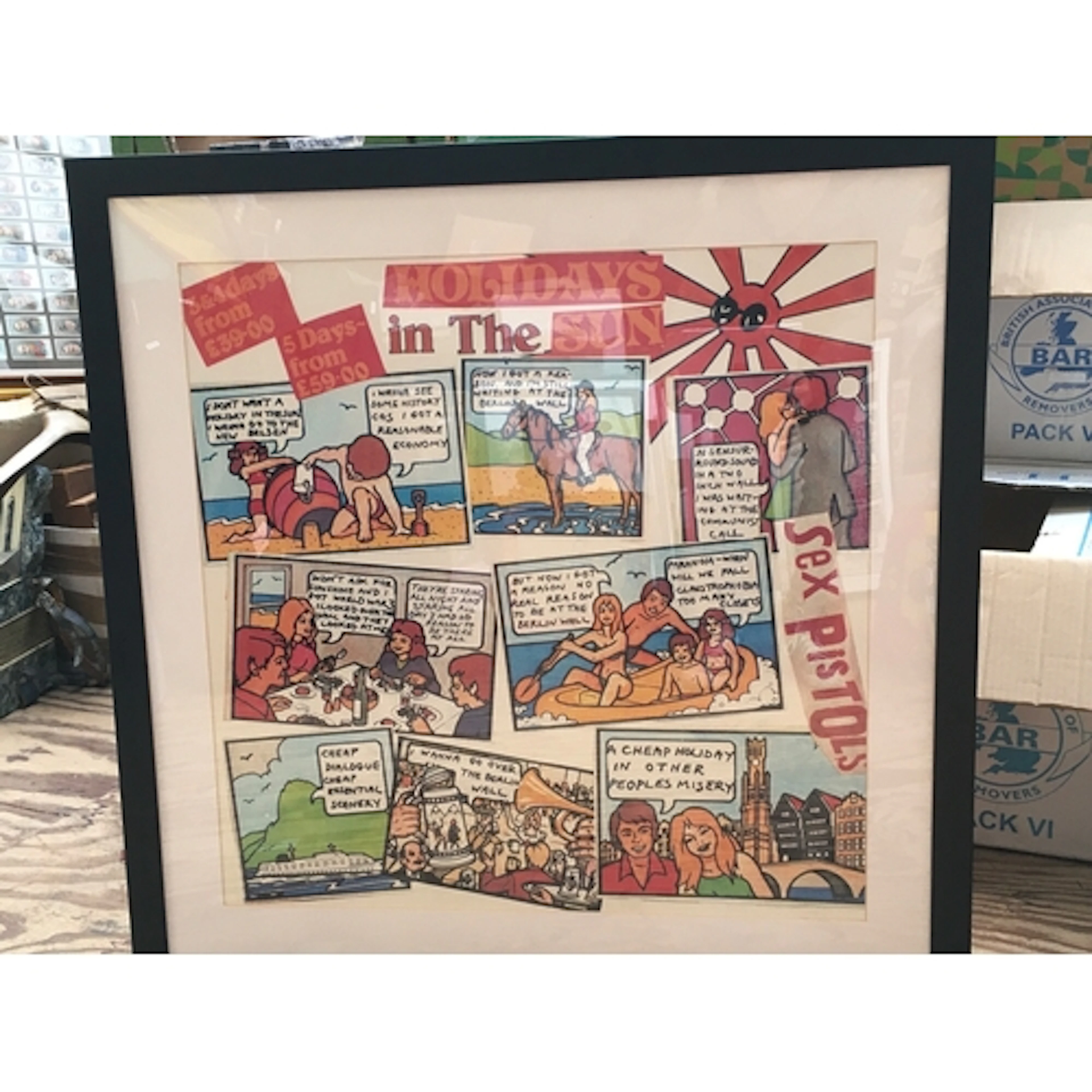 A framed and glazed reproduction Sex Pistols poster for the ...