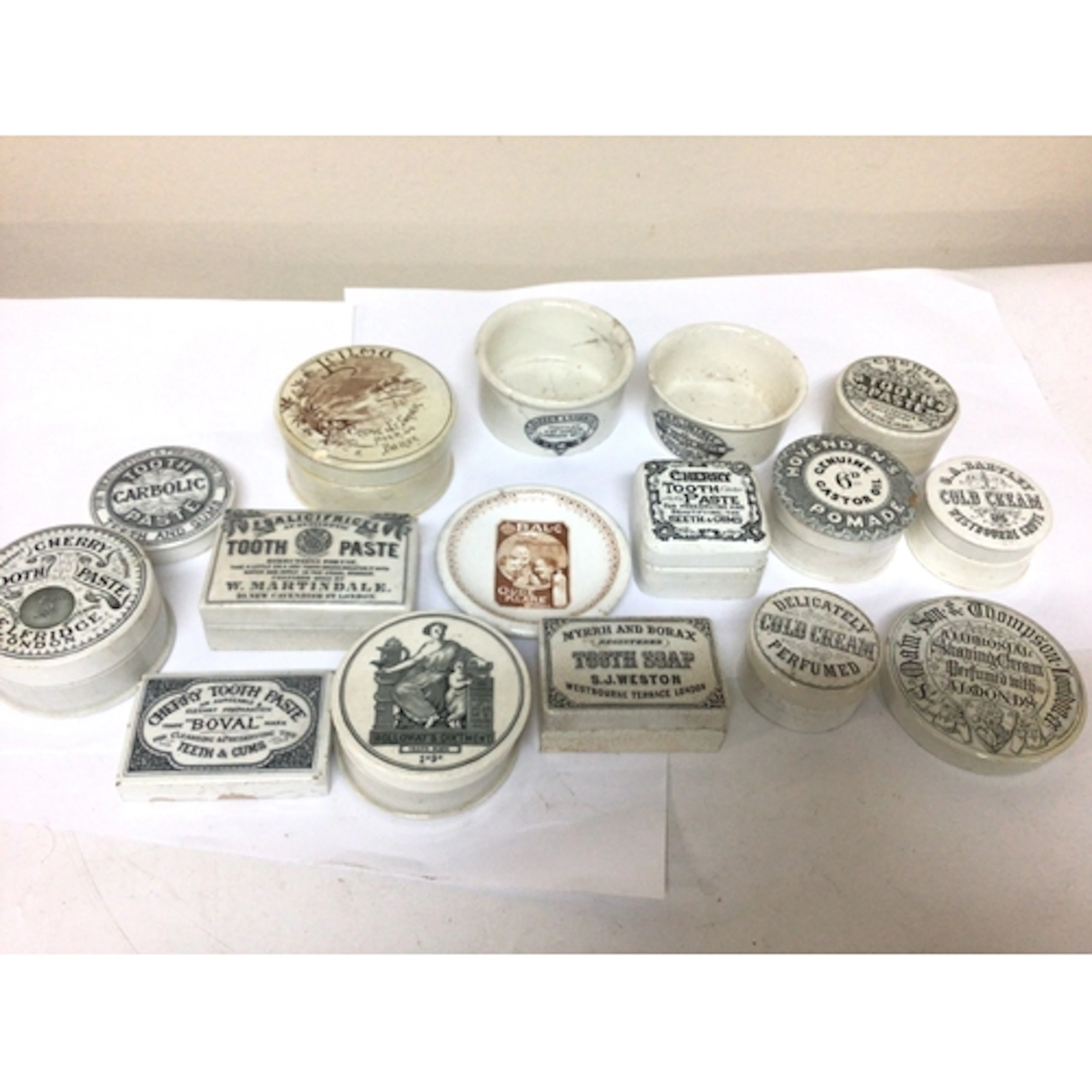 A collection of Victorian ceramic Tooth paste Hollowa...