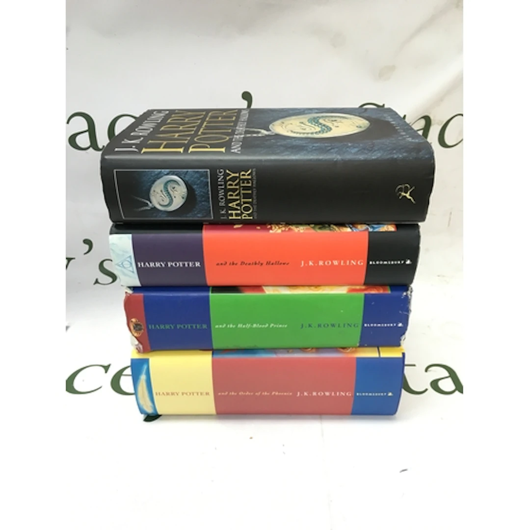 Four Harry Potter books, all first editions with rare 2005 H...