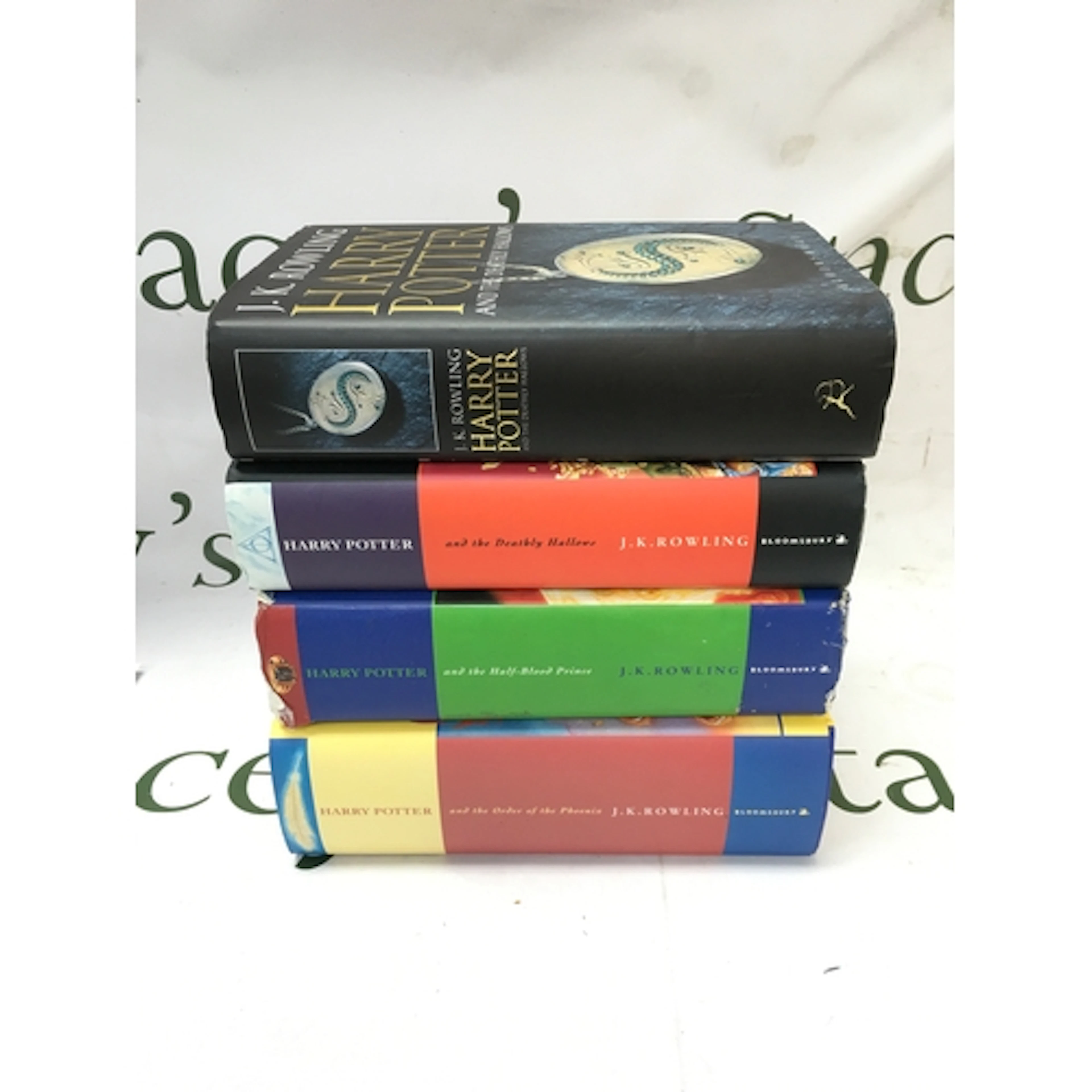 Four Harry Potter books, all first editions with rare 2005 H...