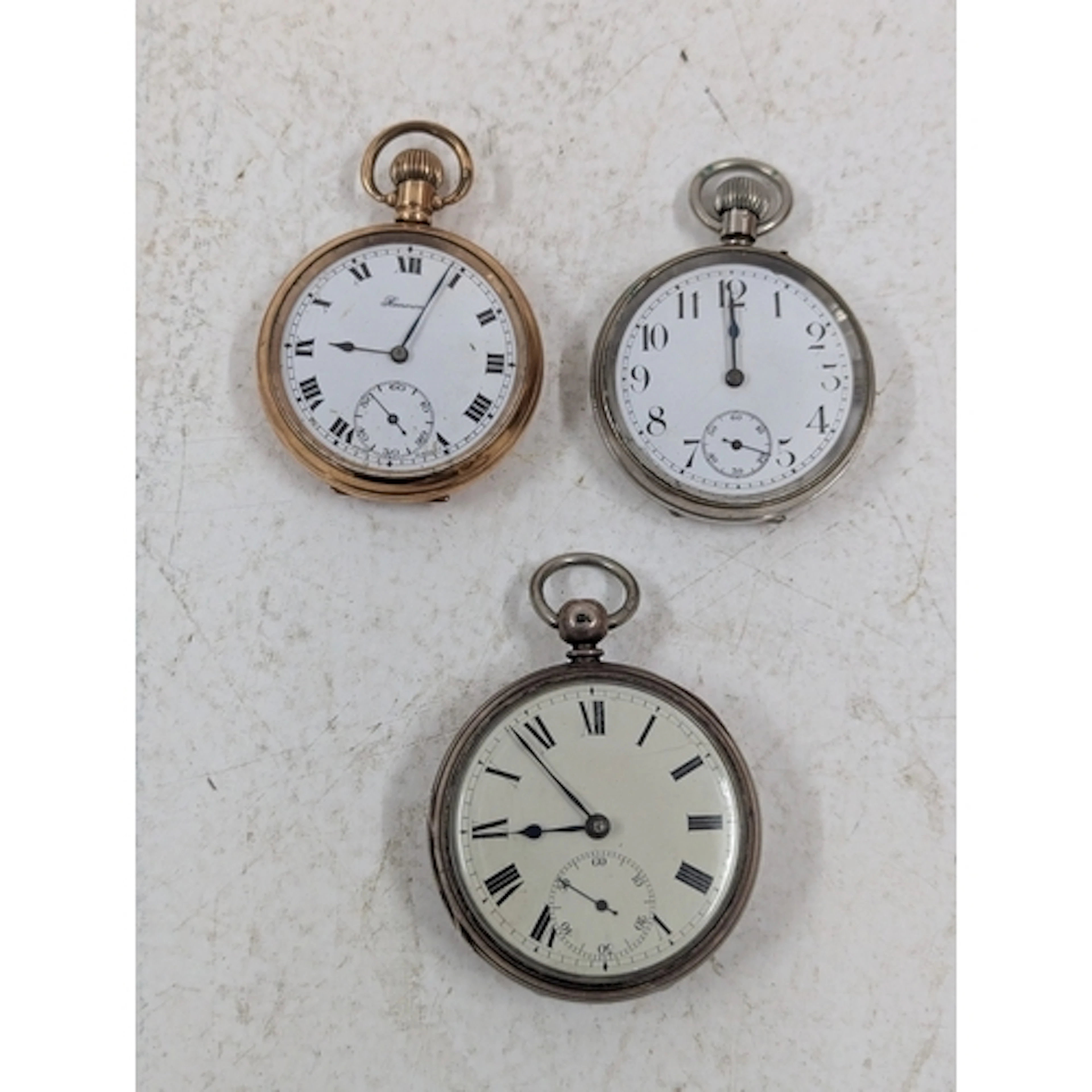 Three open faced pocket watches, to include a silver cased e...