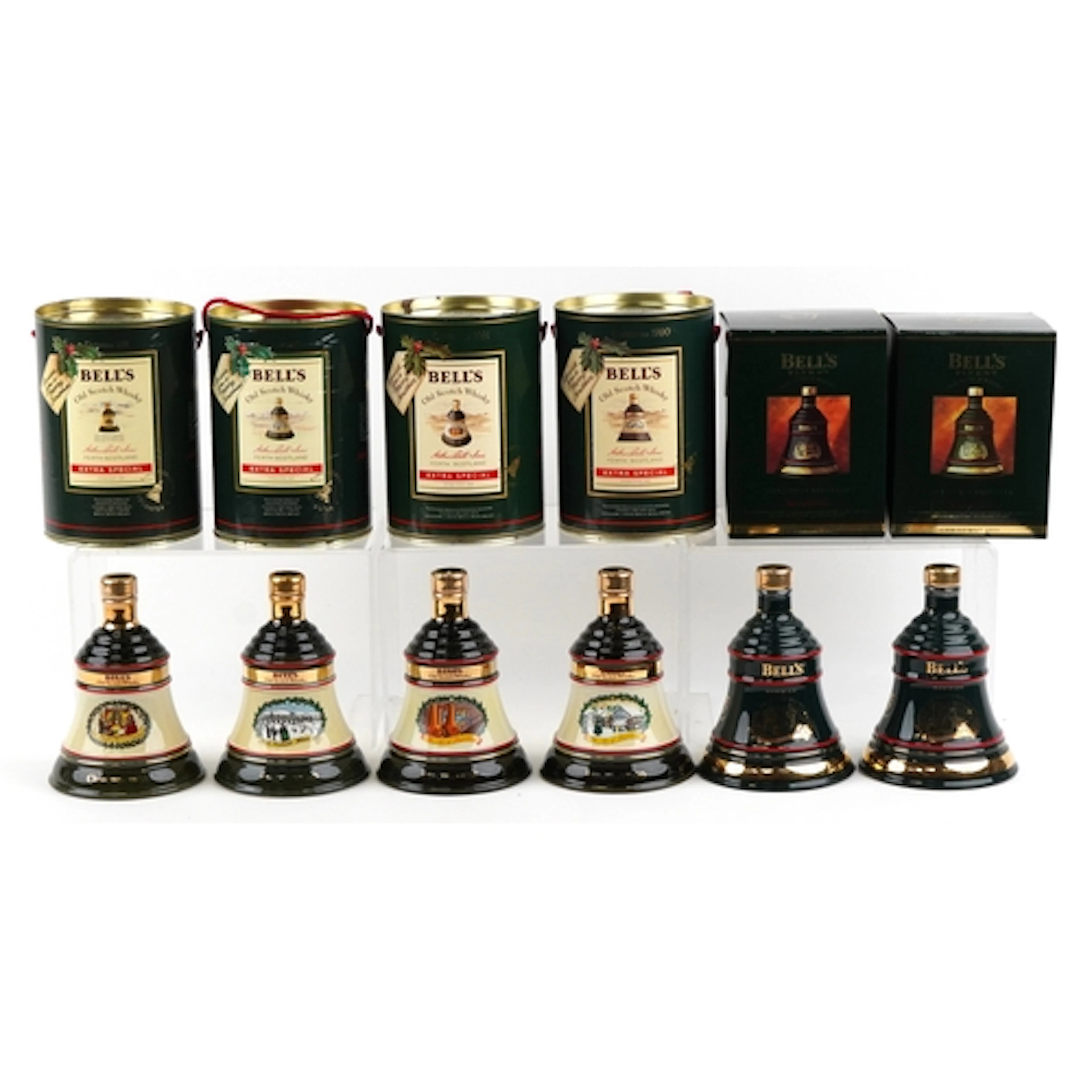 Six Bell's Christmas Edition whisky decanters comprising 198...