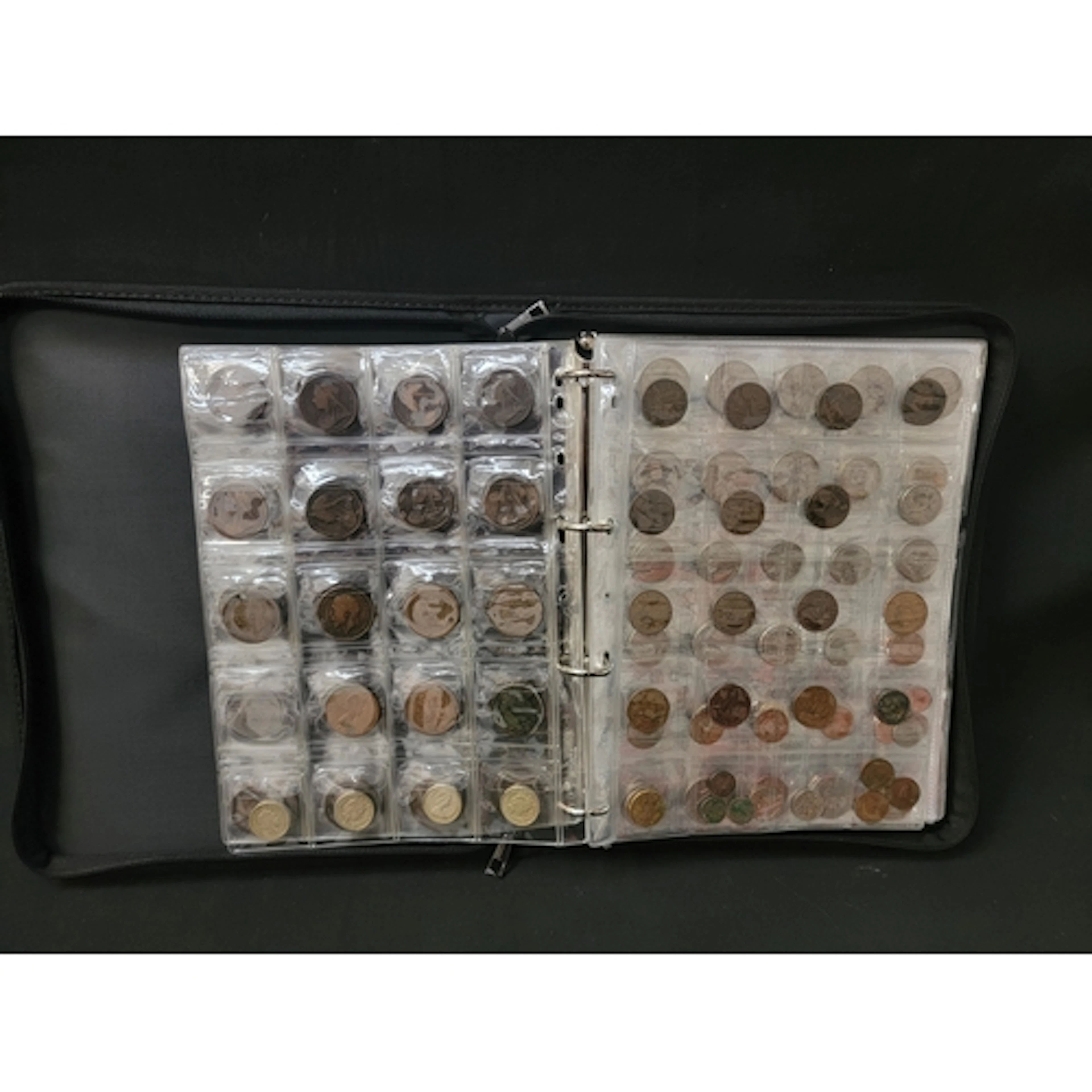FOLDER OF COINS AND NOTES including a large selection of Vic...