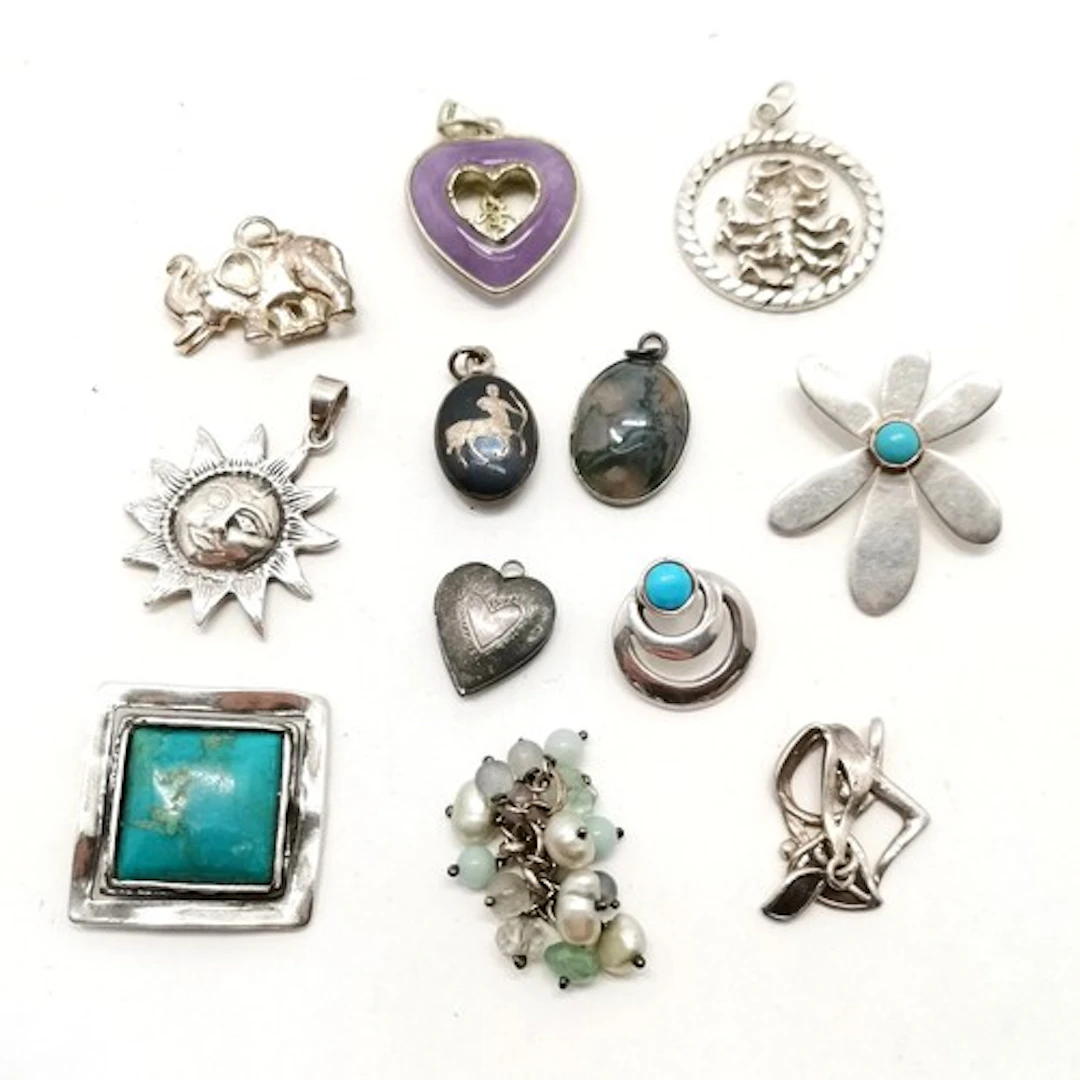 12 x silver pendants inc elephant, sun, lavender heart, ston...