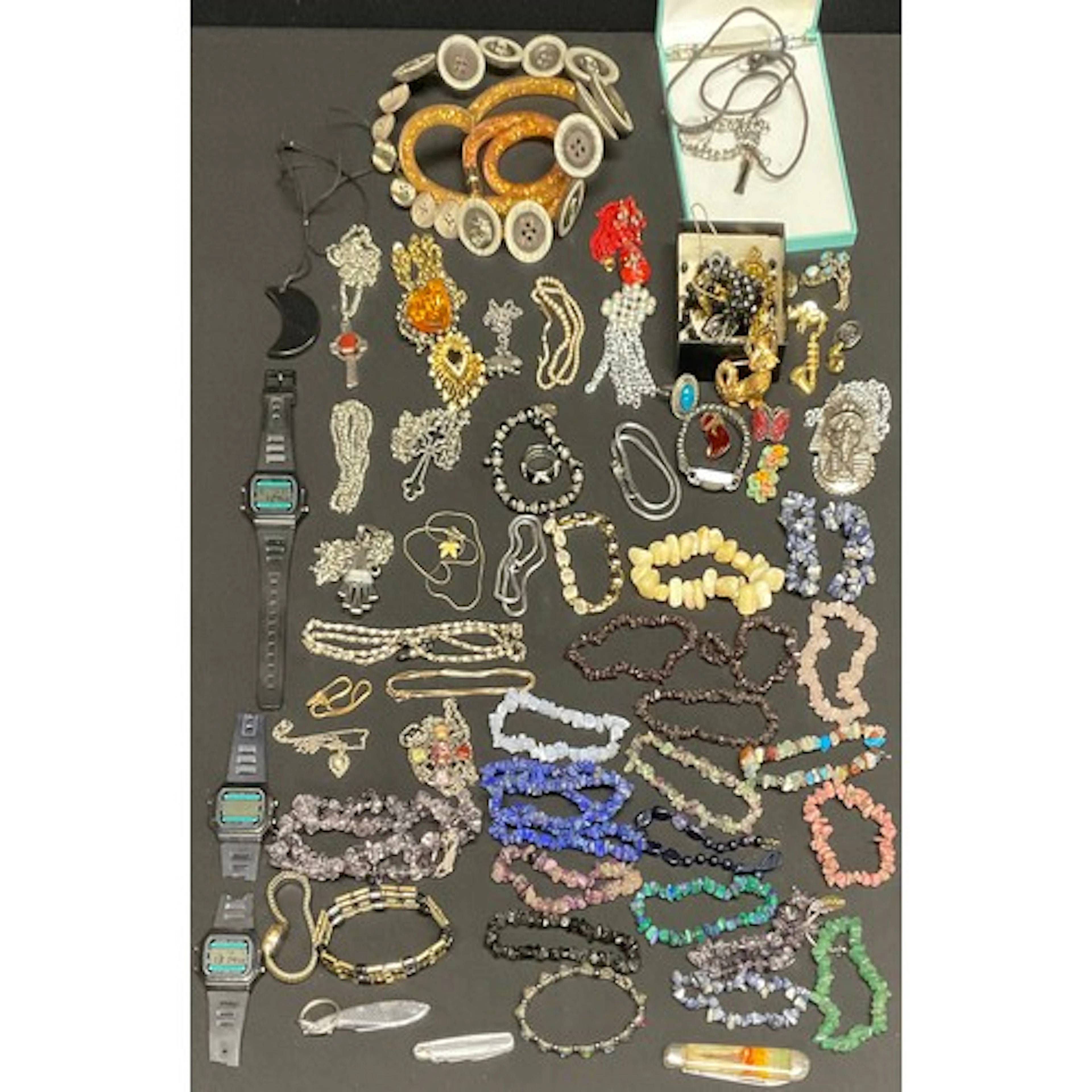 A selection of semi-precious jewellery, costume jewellery an...