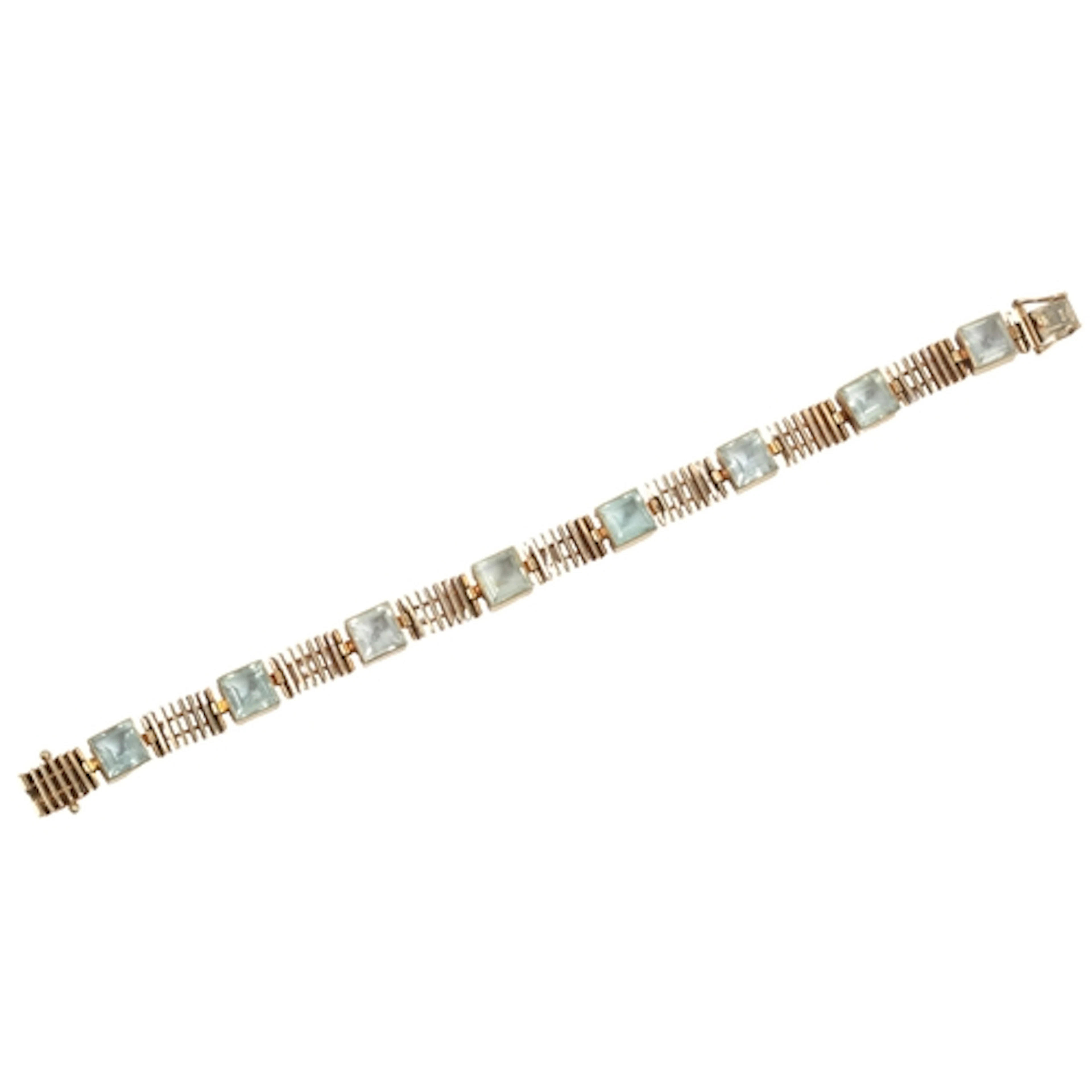 A modernist aquamarine bracelet, 1970s, collet-set with squa...