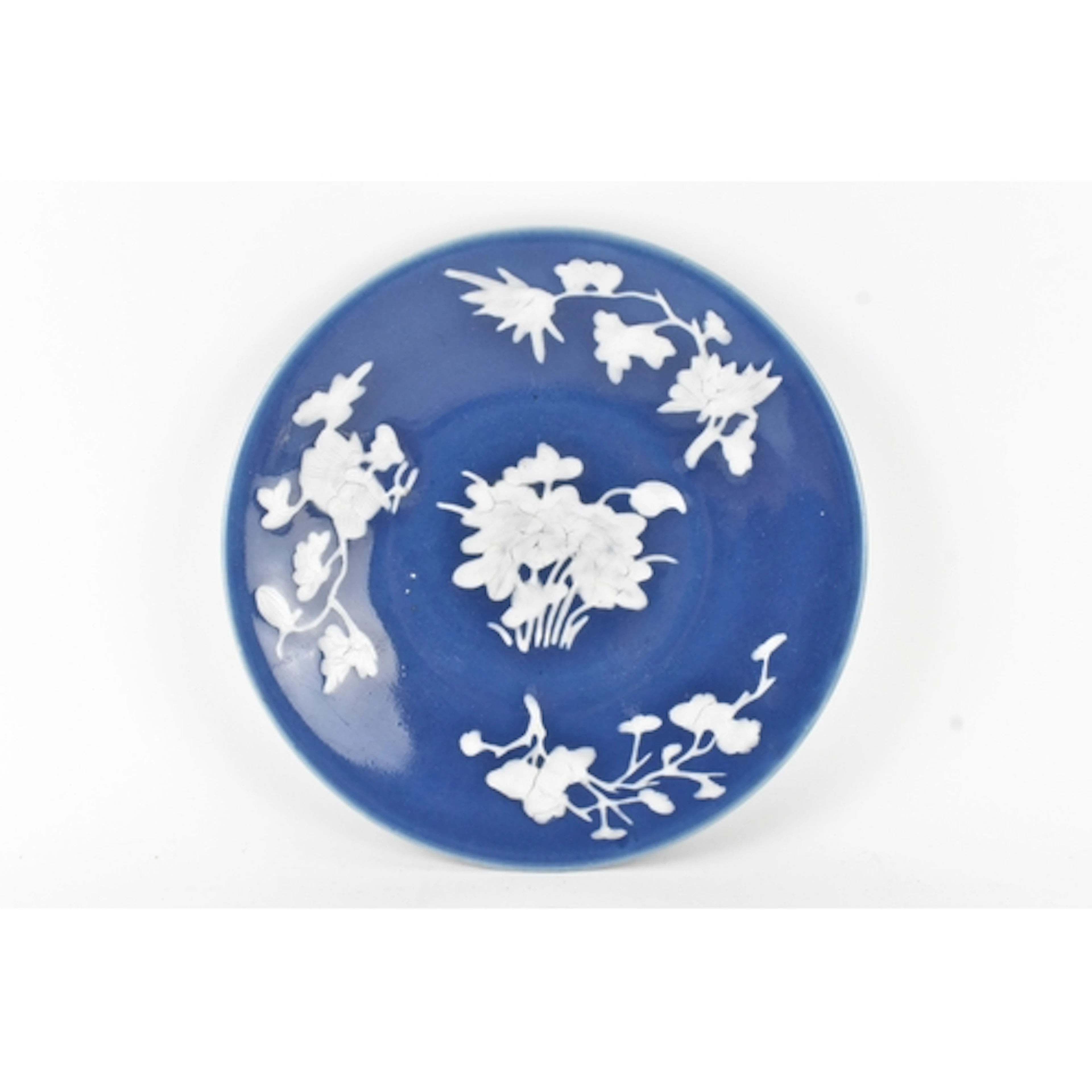 A Chinese Qing dynasty blue-ground porcelain dish, 19th cent...