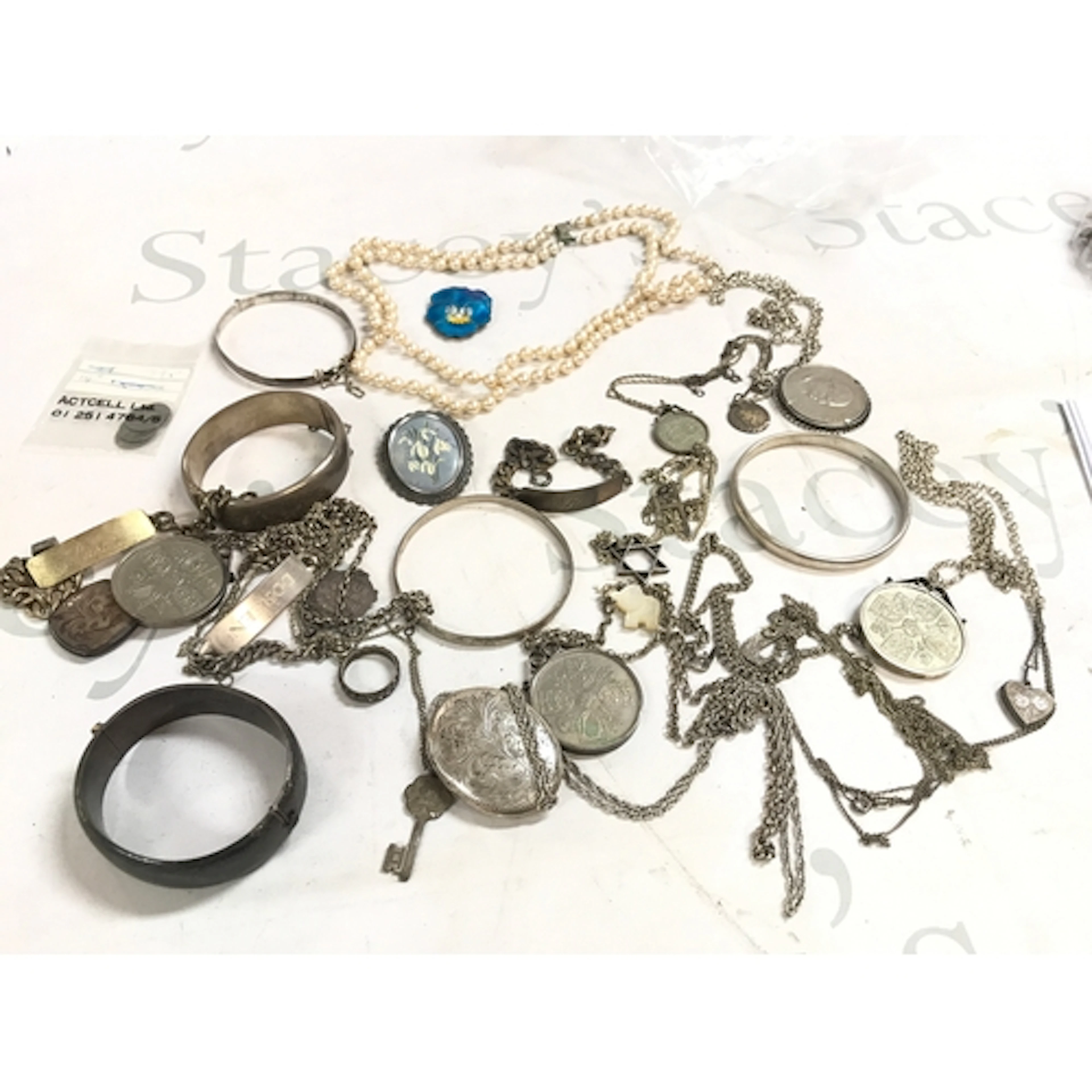 A quantity of silver bangles, necklaces etc