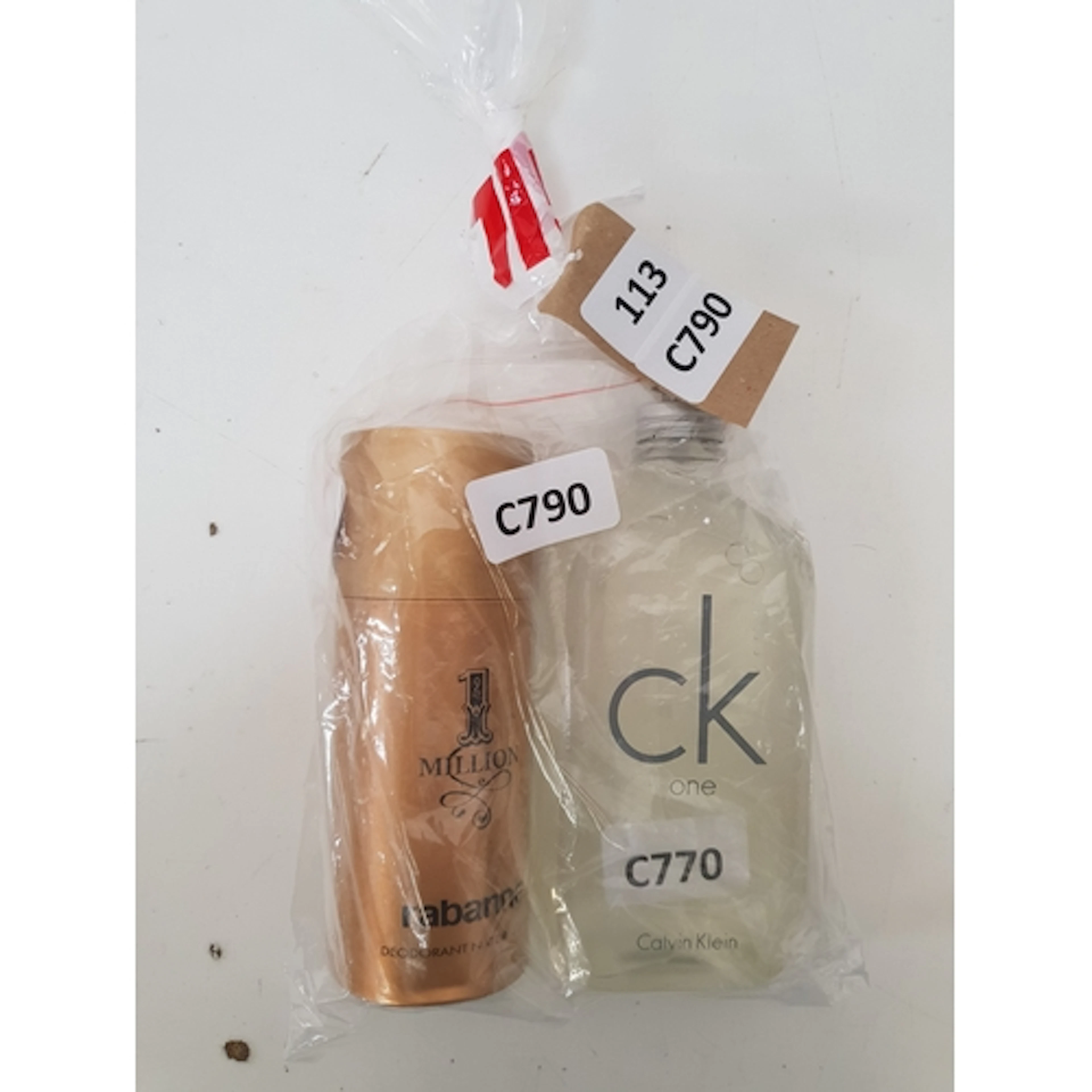 TWO USED TOILETRIES including CK and Rabanne