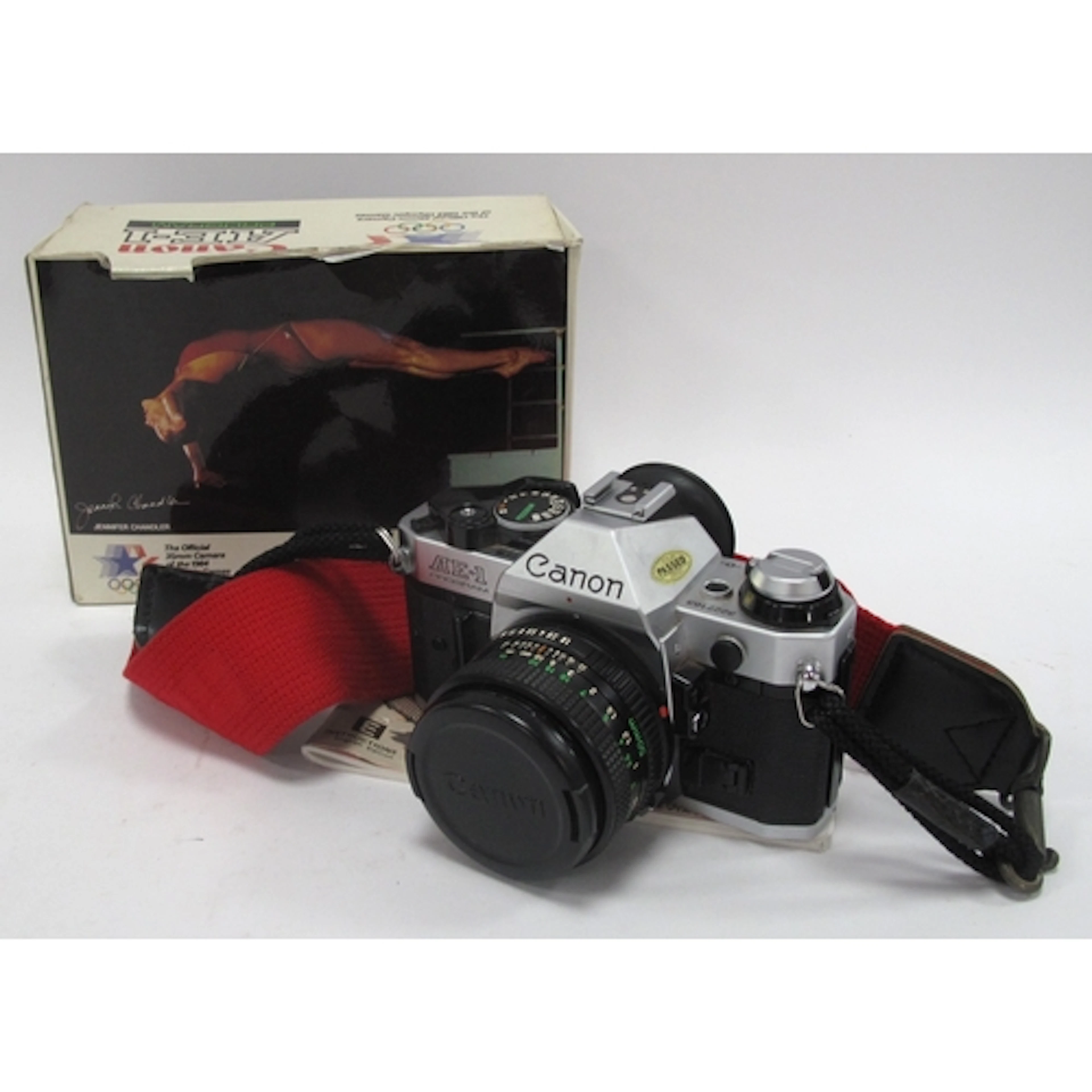 A Circa 1984 Canon AE-1 Program 35mm SLR Film Camera with Ca...