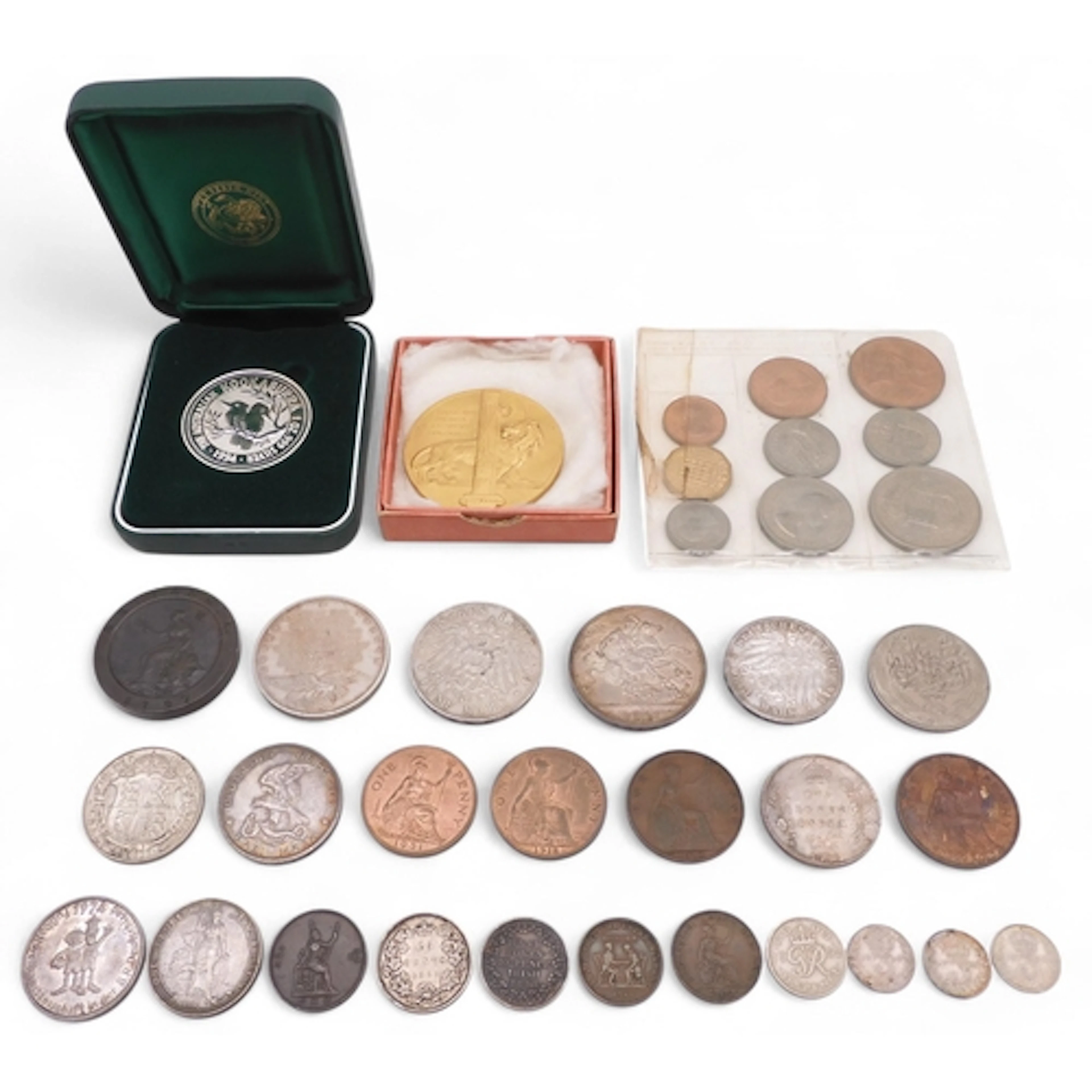 A lot comprising various worldwide coins, tokens and medals ...