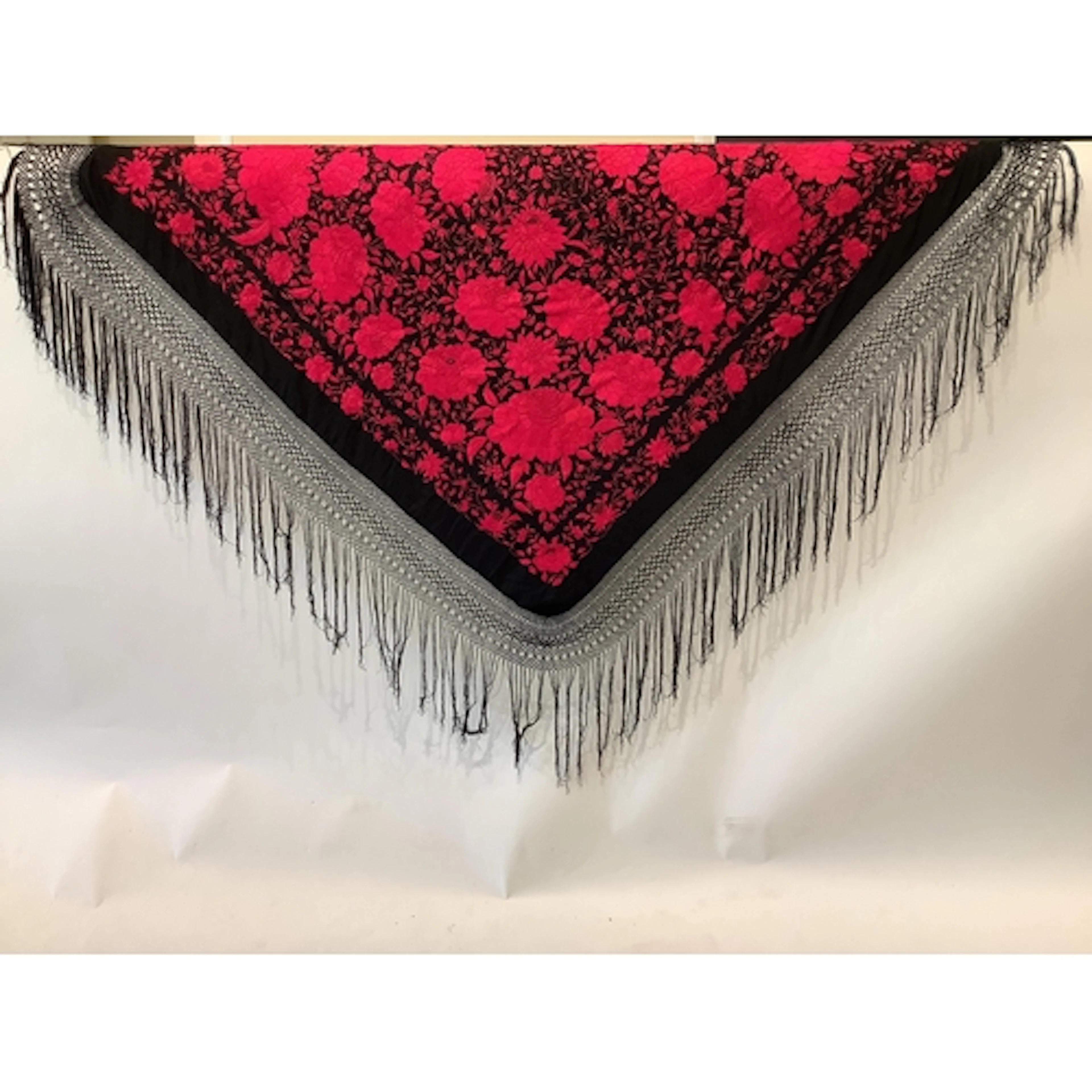 A large silk embroidered Chinese shawl, decorated with an a...