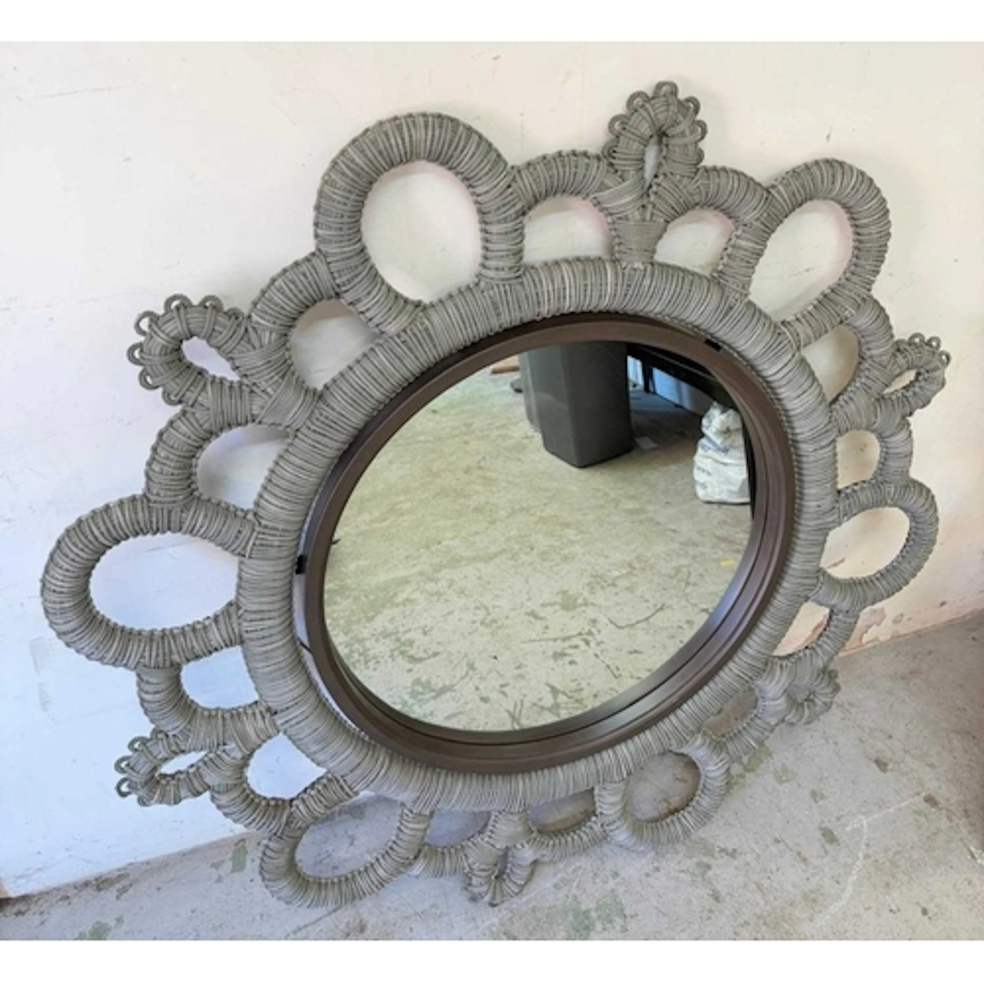 Circular wall mirror features a braided rope frame Dia136cm ...
