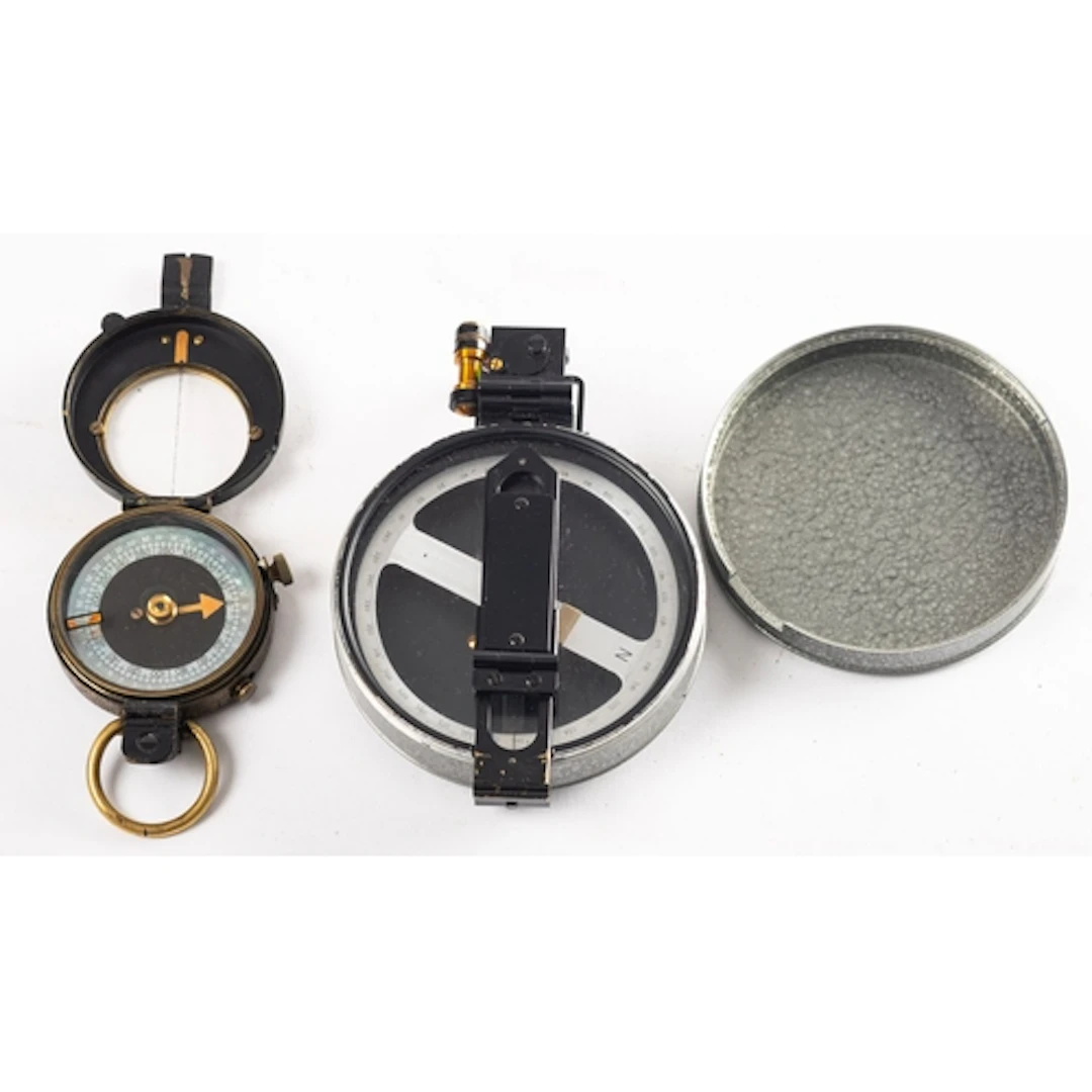 A WWI era Verners pattern compass in leather case. Together ...