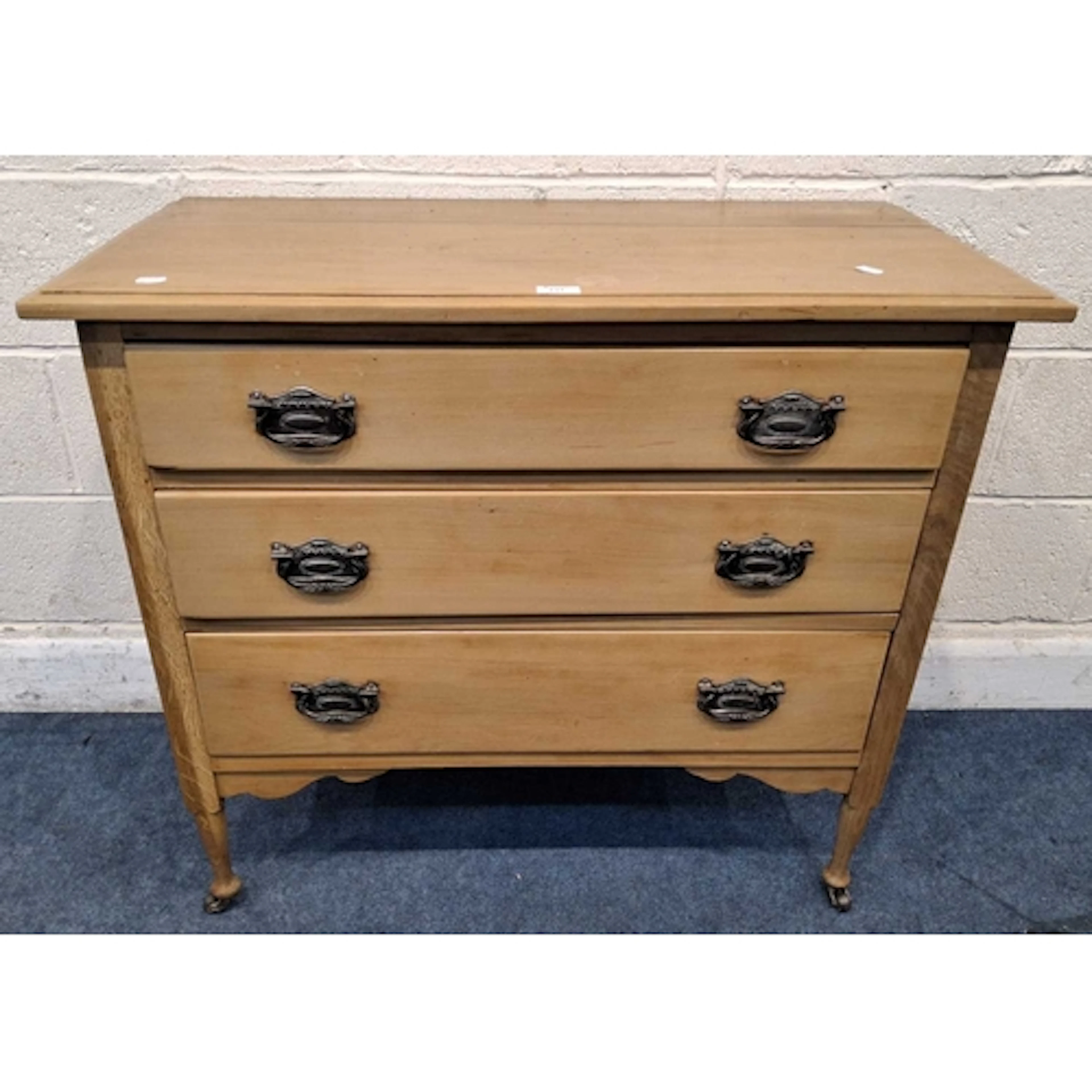 AN EARLY 20TH CENTURY SATINWOOD CHEST OF THREE DRAWERS, rais...