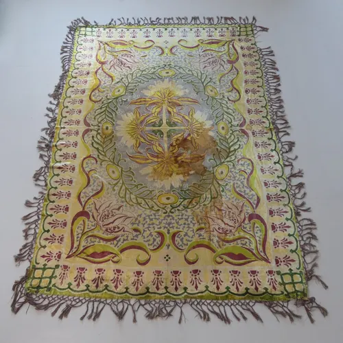 A large Art Nouveau period machined velour throw, in the man...