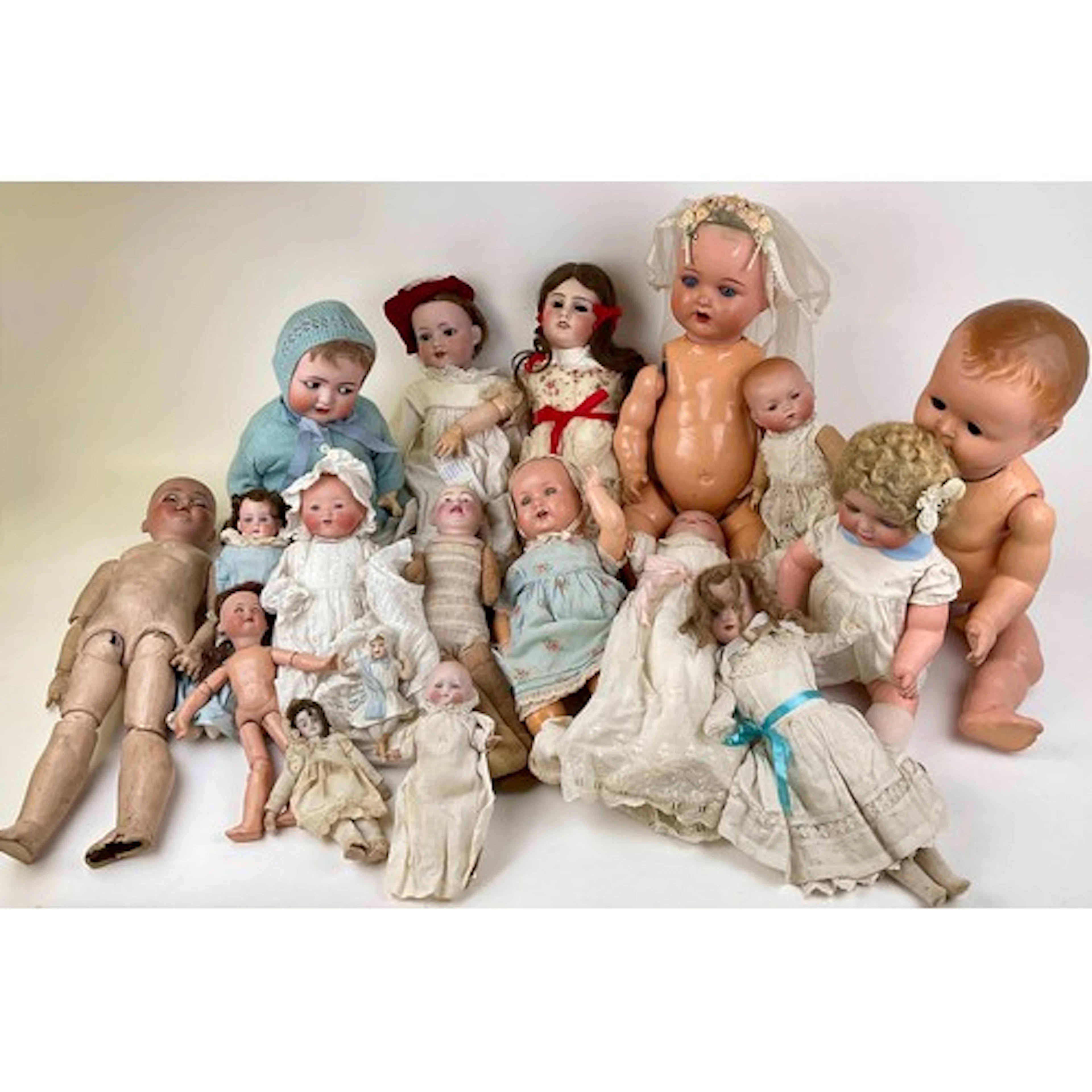 Dolls - An early 20th English bisque shoulder head, soft bod...