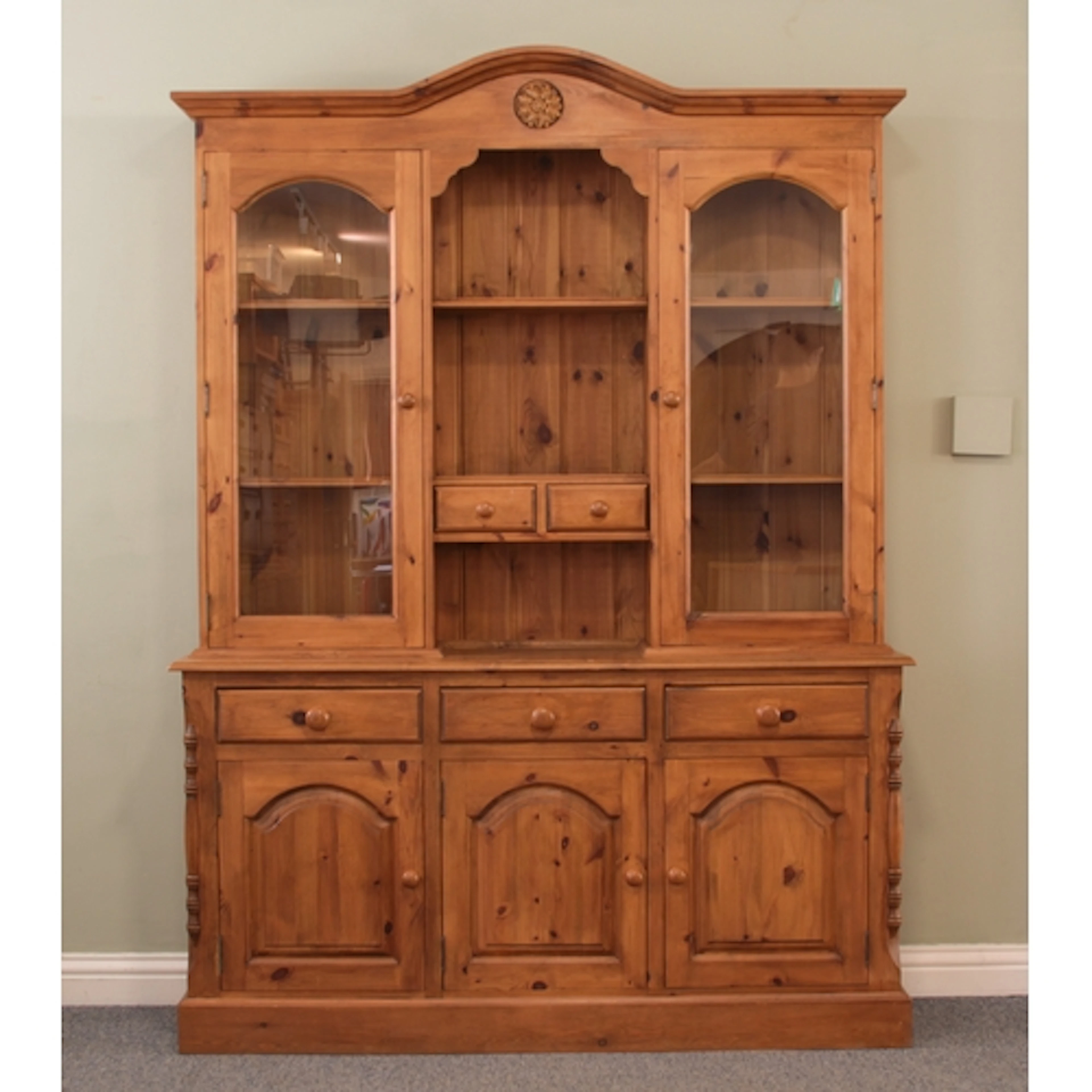 A modern Victorian-style pine dresser - the arched cornice w...