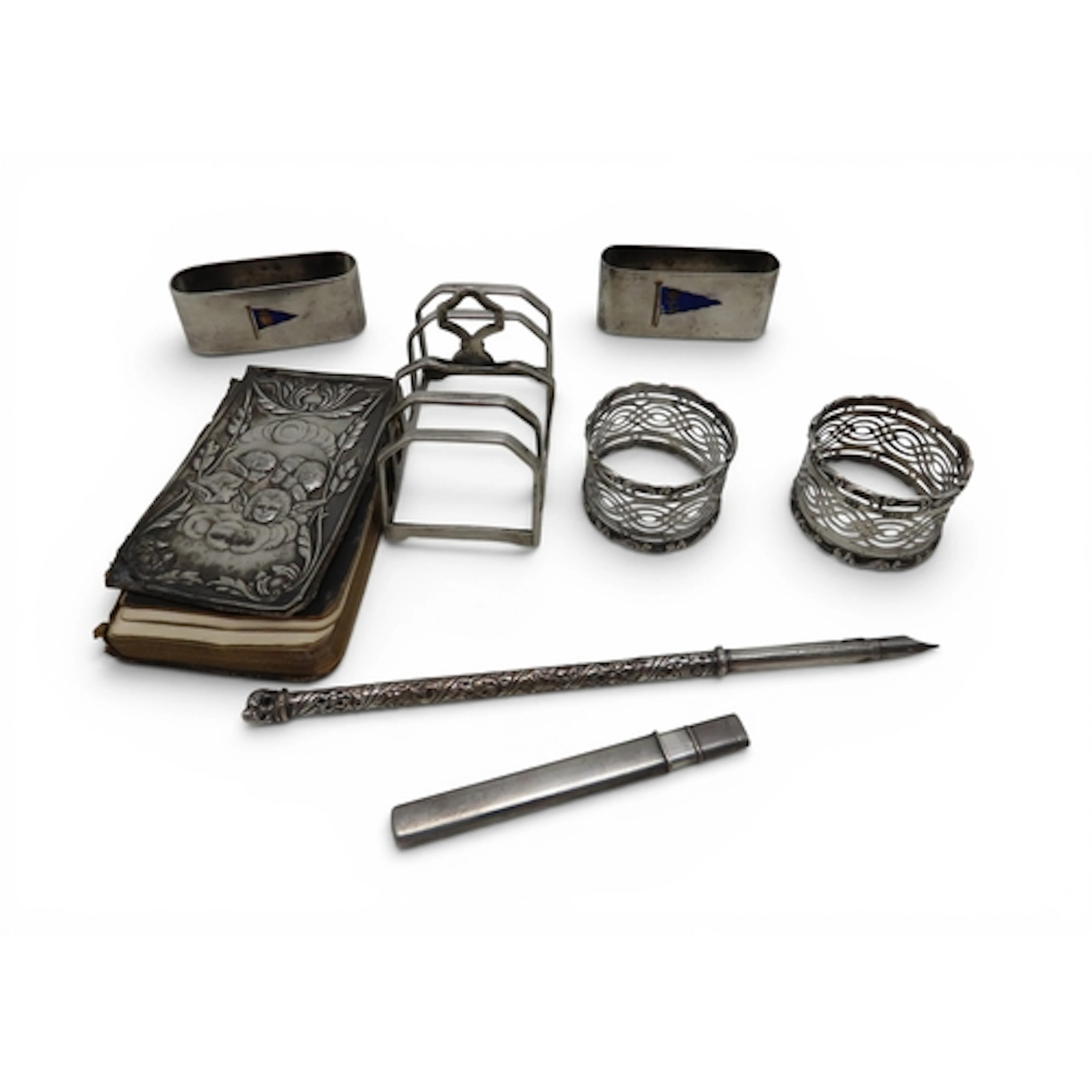 A collection of silver including a pair of candlesticks, by ...