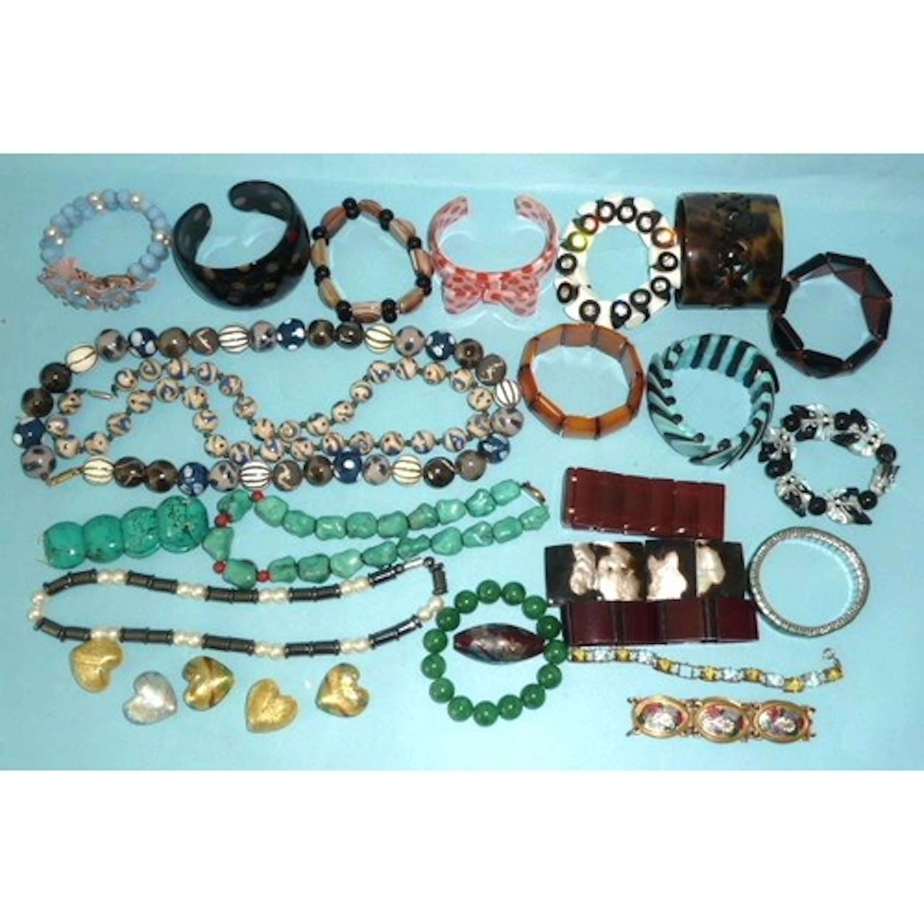 A Miriam Haskell-style bracelet and a collection of art glas...