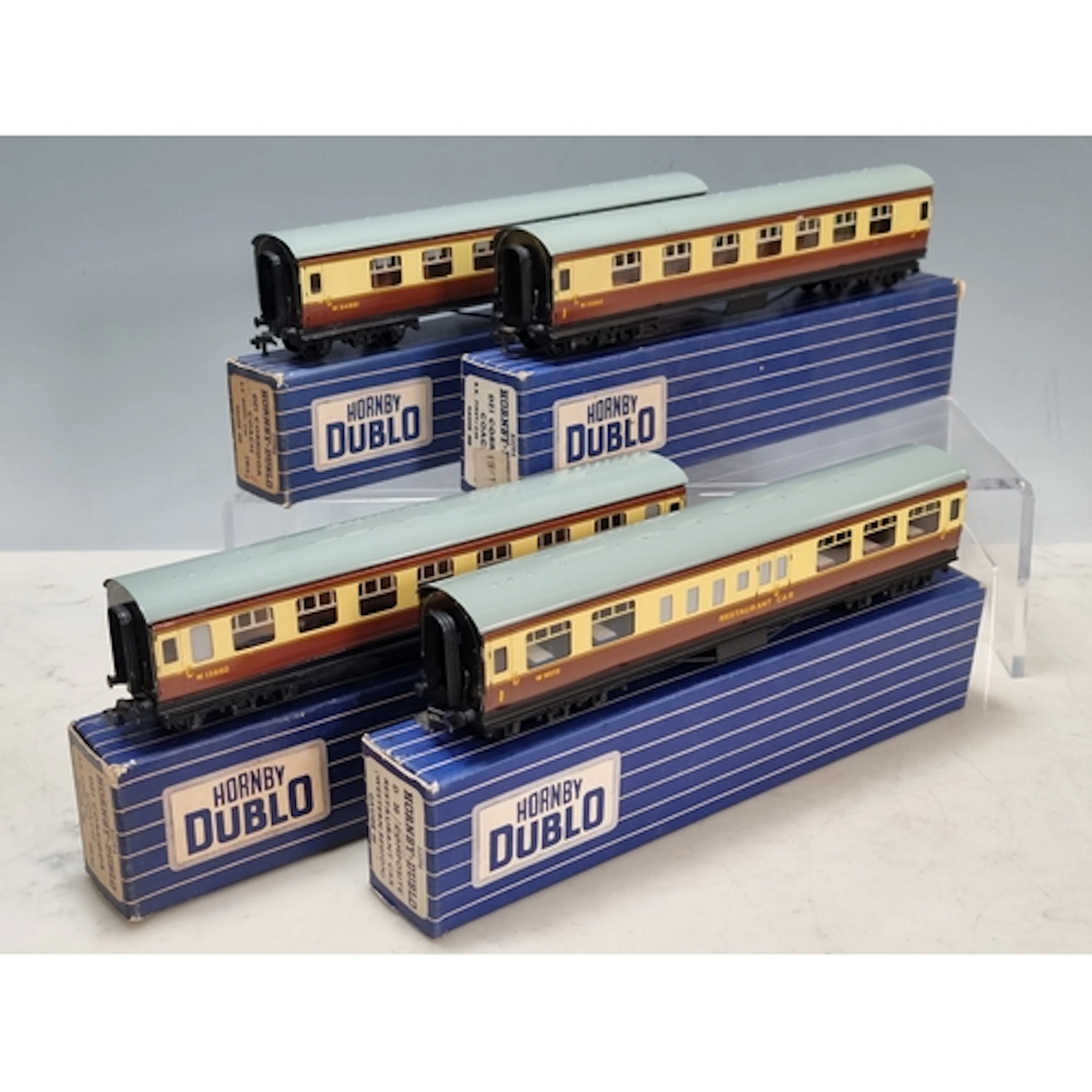 Three boxed Hornby Dublo D21 Coaches and a D20 Restaurant Co...