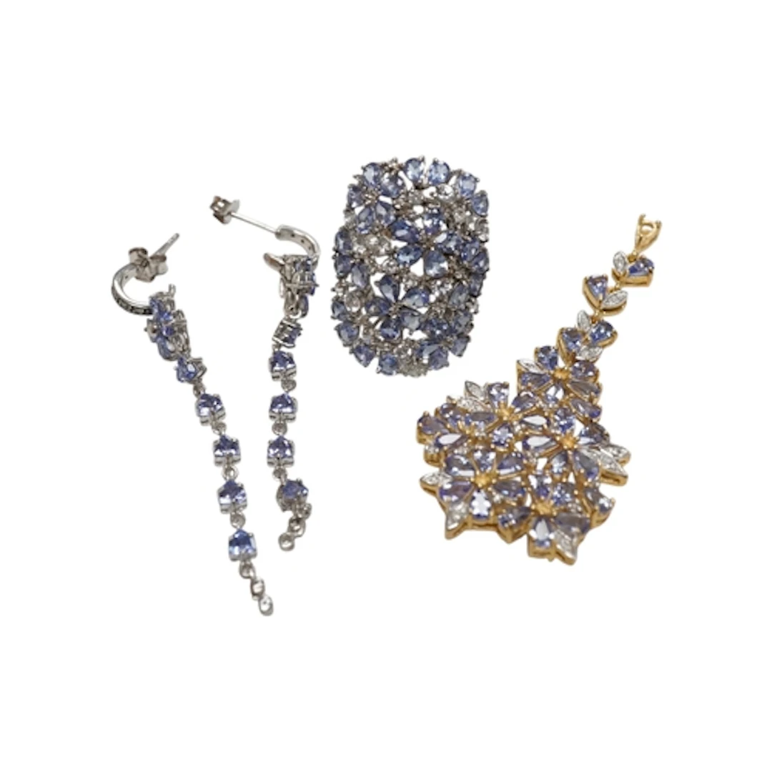 A collection of tanzanite jewels, comprising: an articulated...