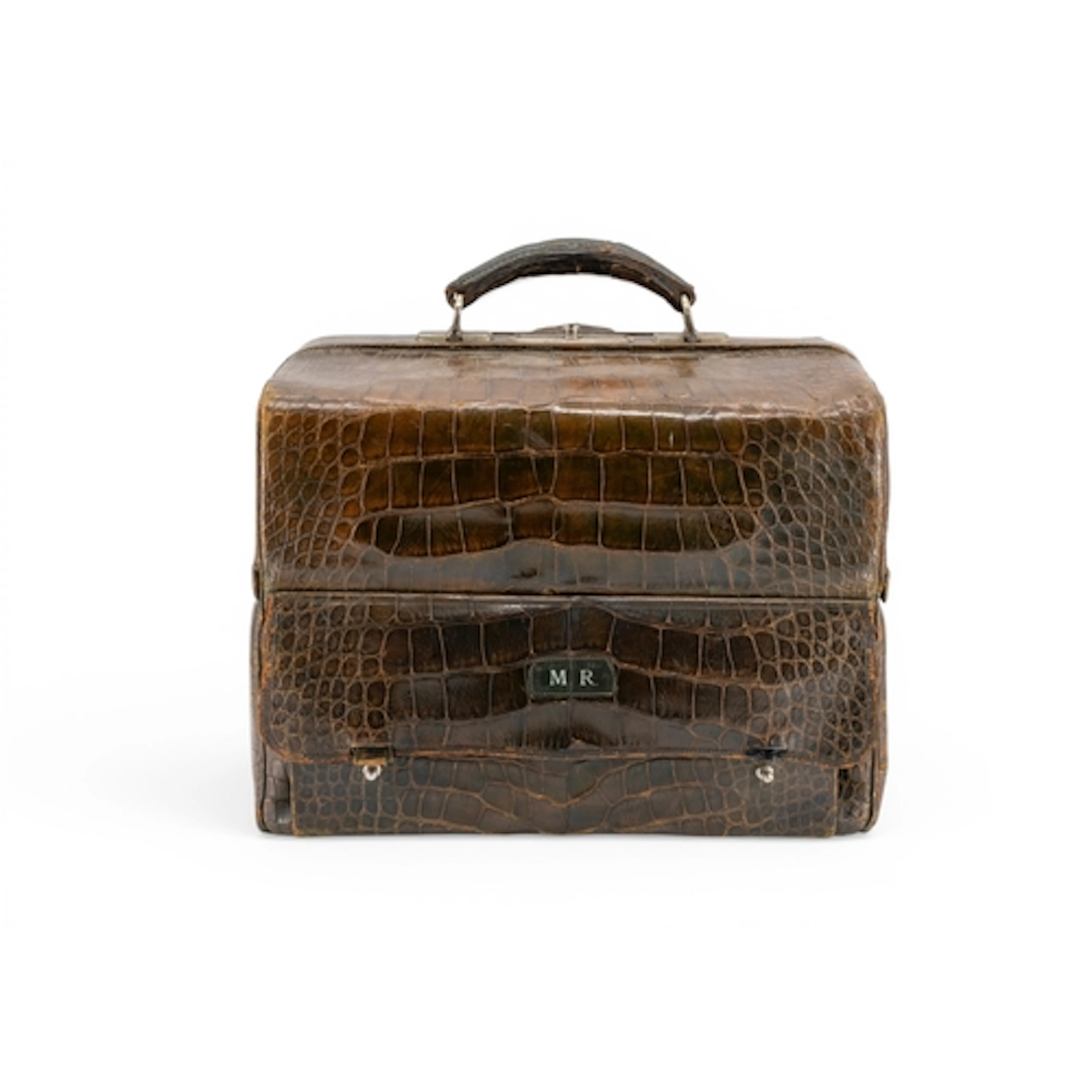 A FAUX CROCODILE TRAVELLING TOILET BAG with green silk-lined...