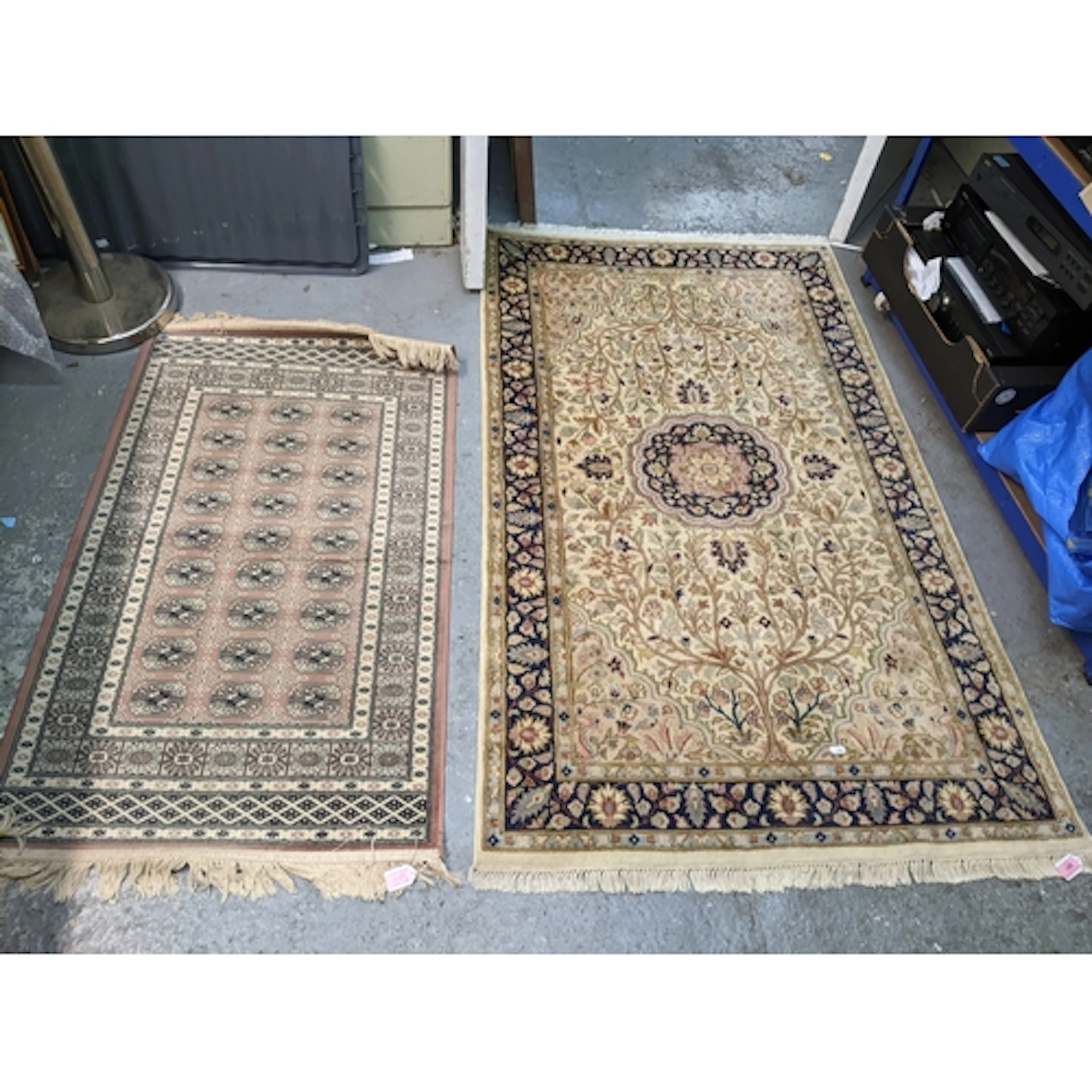 Three rugs to include a Persian, Isfahan style hand woven ru...