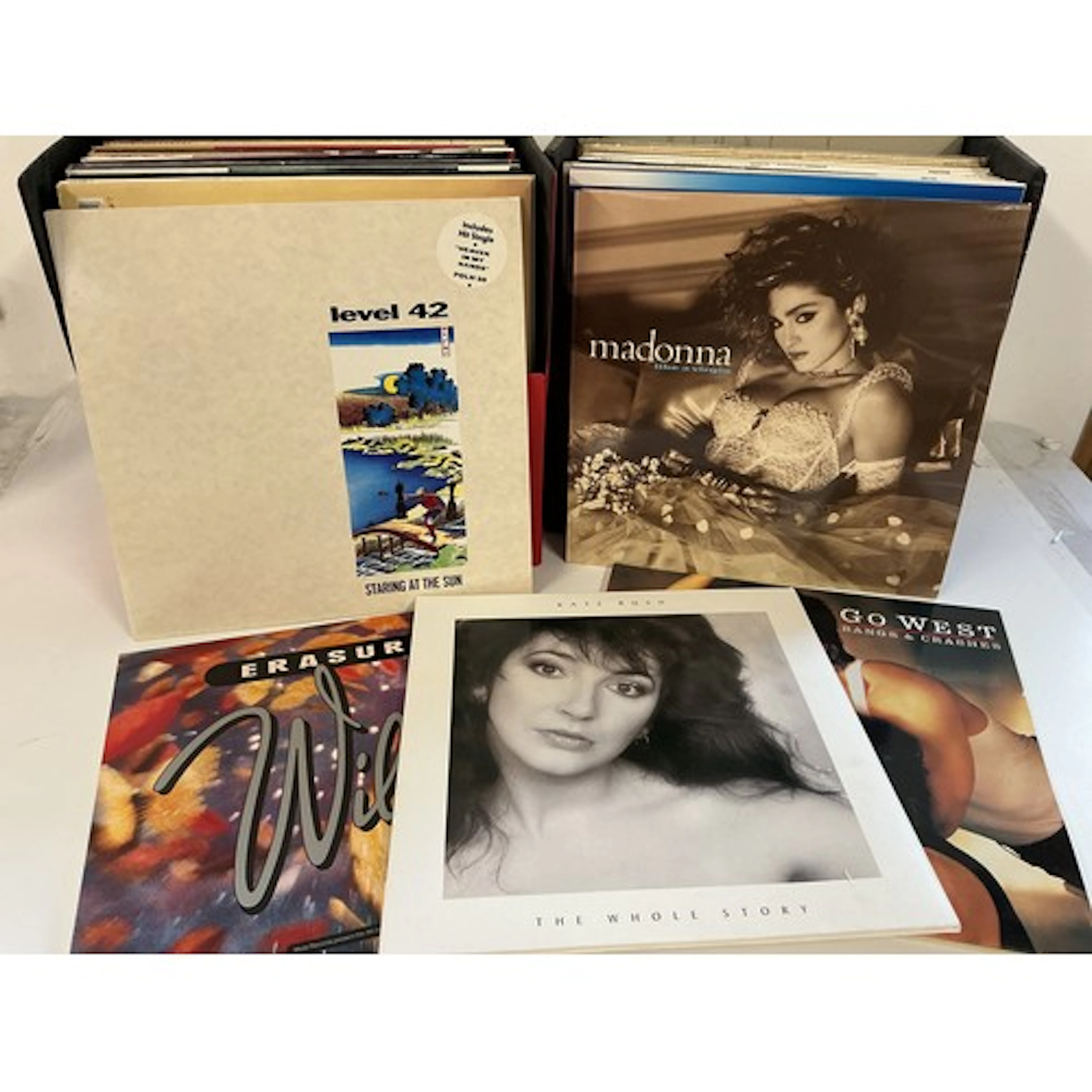 Two record cases of LPs and 12” singles by various artists i...