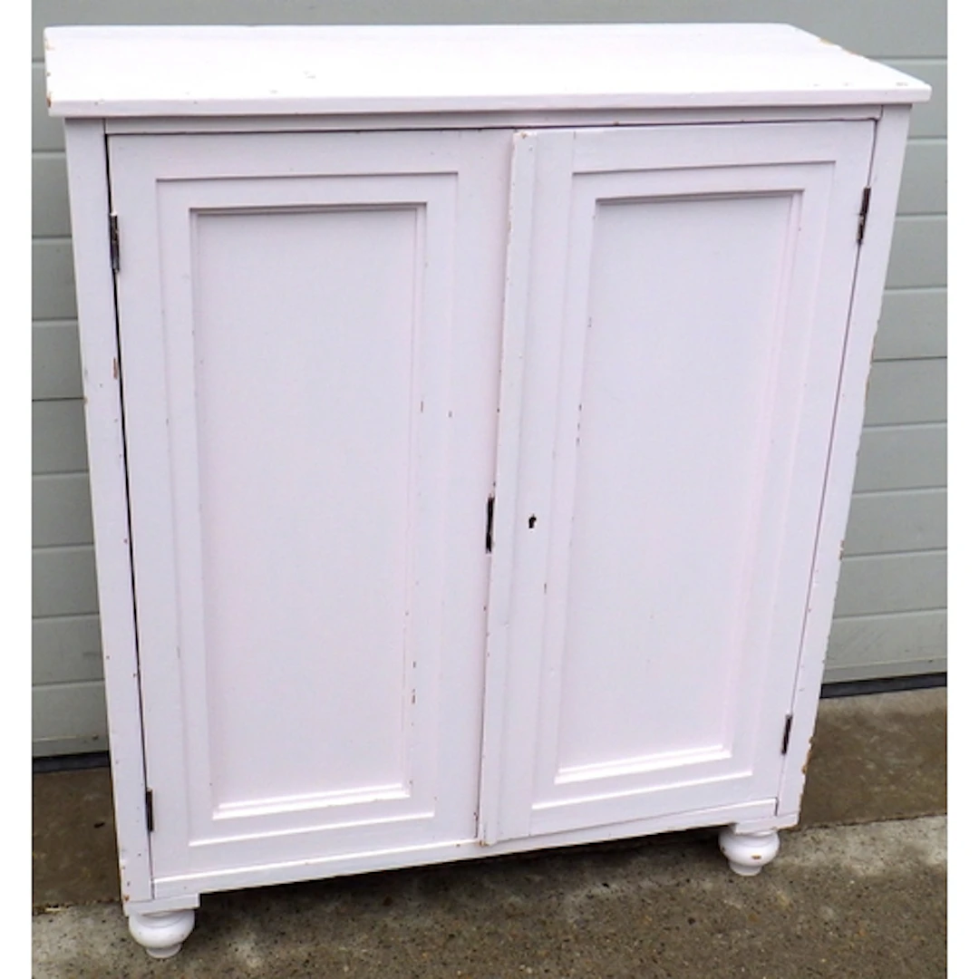 A painted pine low cupboard, later lock, door altered, 102cm...