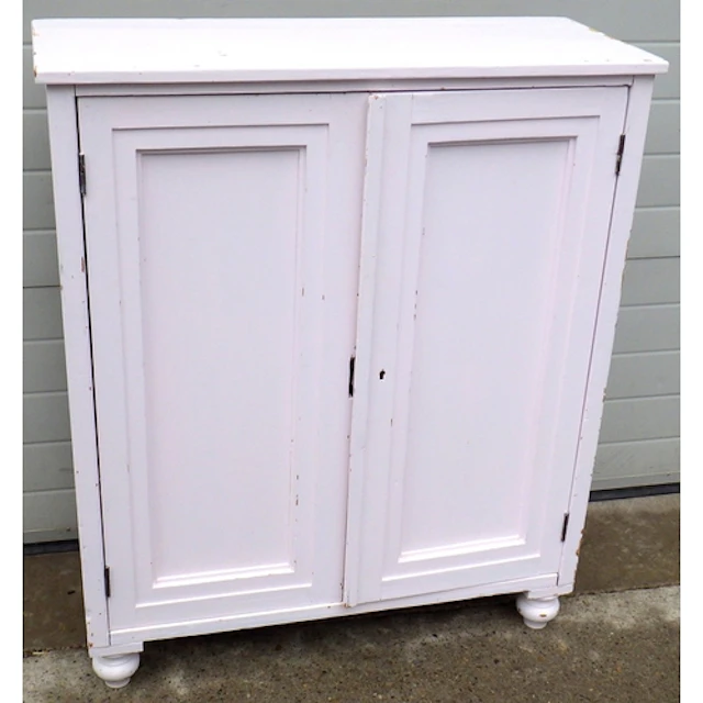 A painted pine low cupboard, later lock, door altered, 102cm...